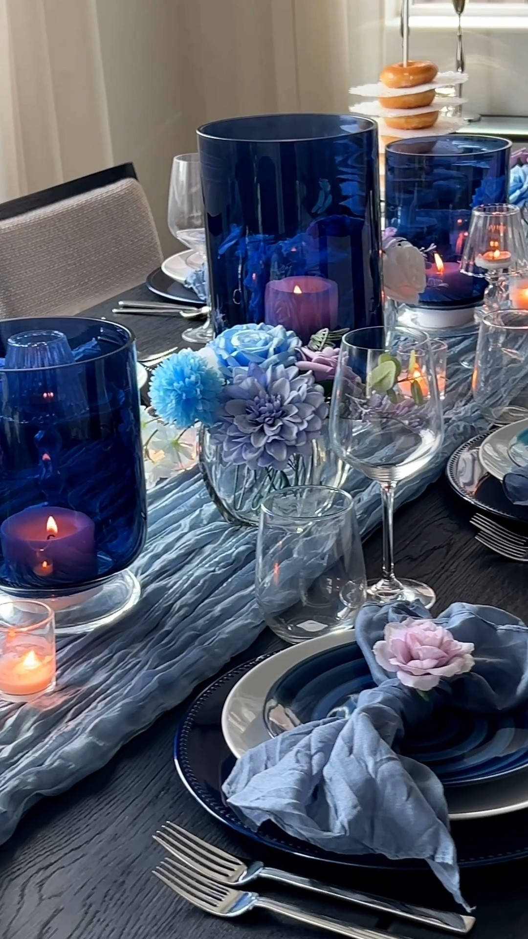 Layered centerpiece details that instantly elevate a tablescape with texture, height, and candlelight.

Tablescape centerpiece decor, centerpiece styling, layered table decor, candle holders, taper candles, glass hurricanes, table styling ideas, modern hosting decor, elegant centerpiece inspiration, neutral tablescape, dining table decor, entertaining at home, silver decor accents, crystal decor, floral centerpiece ideas, elevated hosting essentials, modern hostess style, dining room styling, table layering inspiration

#LTKHome #LTKSaleAlert