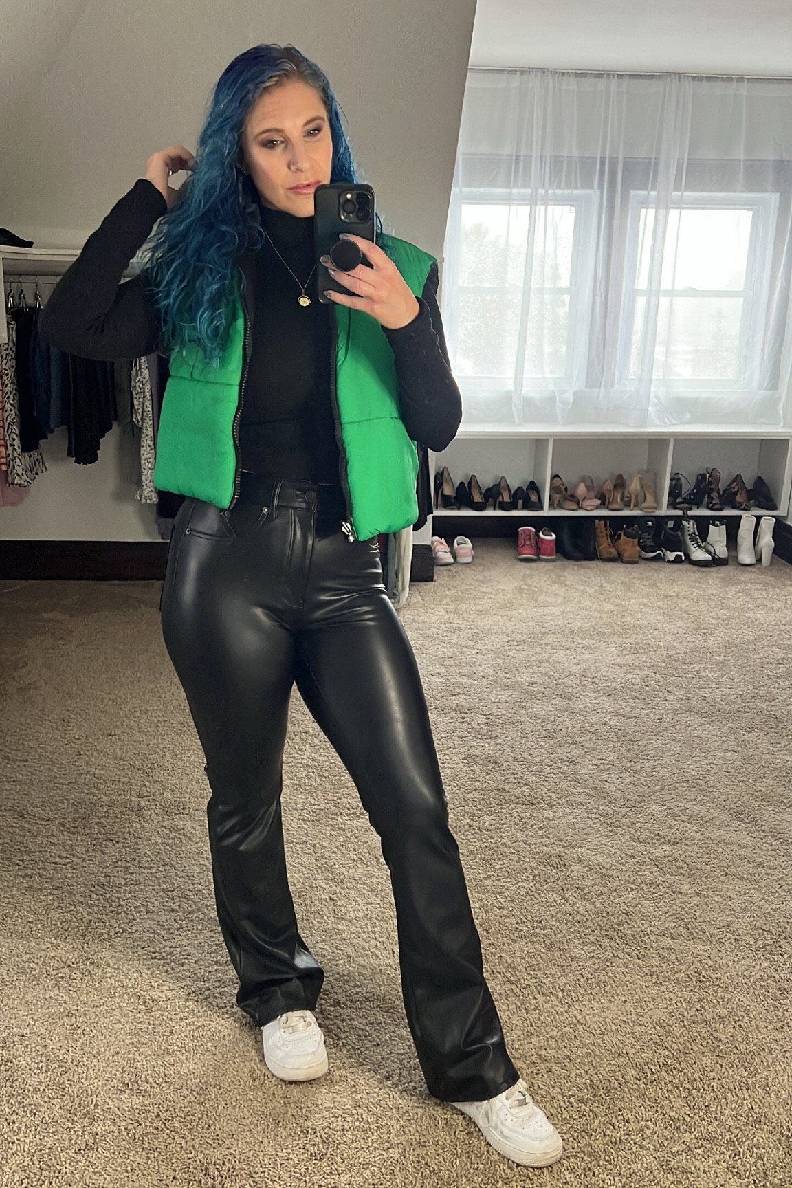 Black turtleneck outfit idea with a pop of color and a bit of texture!

Faux leather flares, flared leather pants, black turtleneck, winter outfit idea, black turtleneck outfit, Poshmark find, green puffer vest

#LTKfindsunder100 #LTKSeasonal #LTKsalealert