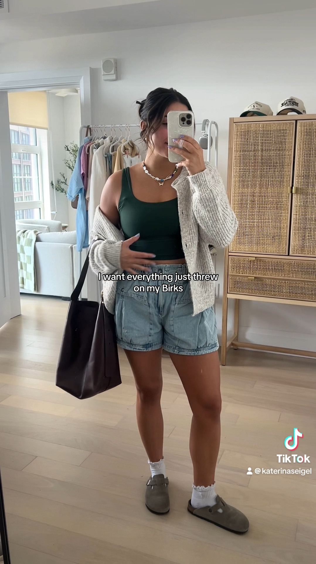 Running errands today which means a cozy outfit is necessary! Love these paperbag shorts from free people, sooo comfy. Paired them with an aerie tank (from their Smoothez collection - my fave sooo soft), & my Birkenstock clogs. Added a cardigan for when it gets breezy! 

+ this madewell tote is one of my favorite bags! A little pricey but looks really nice & is a great work bag (laptop fits great!)

Sizing: 
Shorts - true to size, M
Tank - true to size, M
Birks - 38 (7.5)

#LTKfindsunder100 #LTKSeasonal #LTKxMadewell