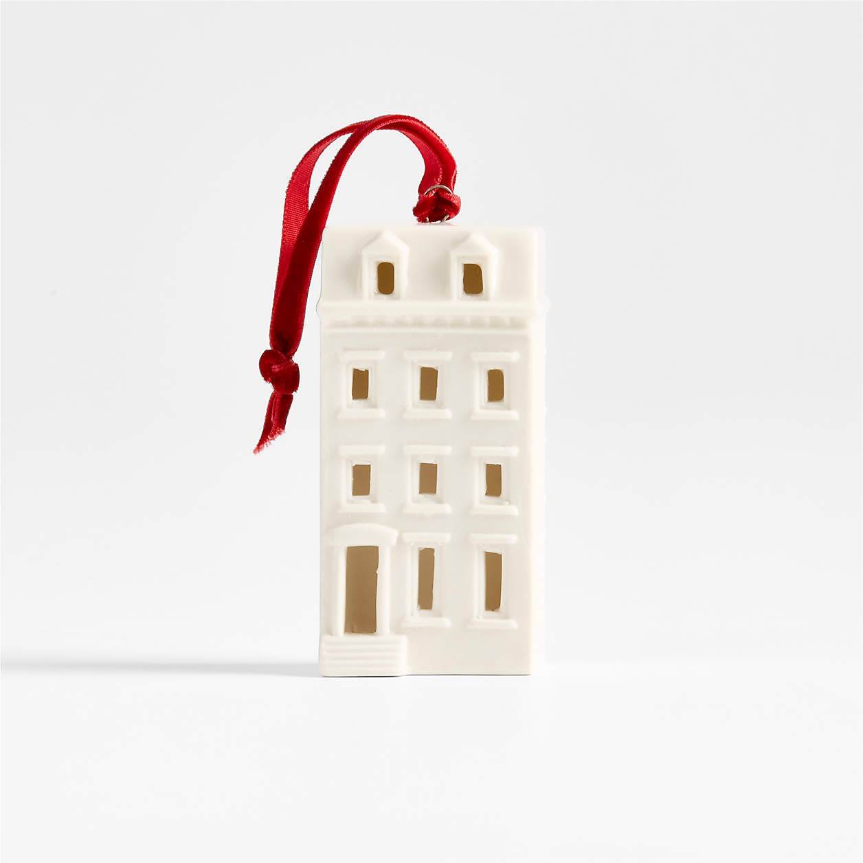 Ceramic White Brownstone Christmas Tree Ornament | Crate & Barrel | Crate & Barrel
