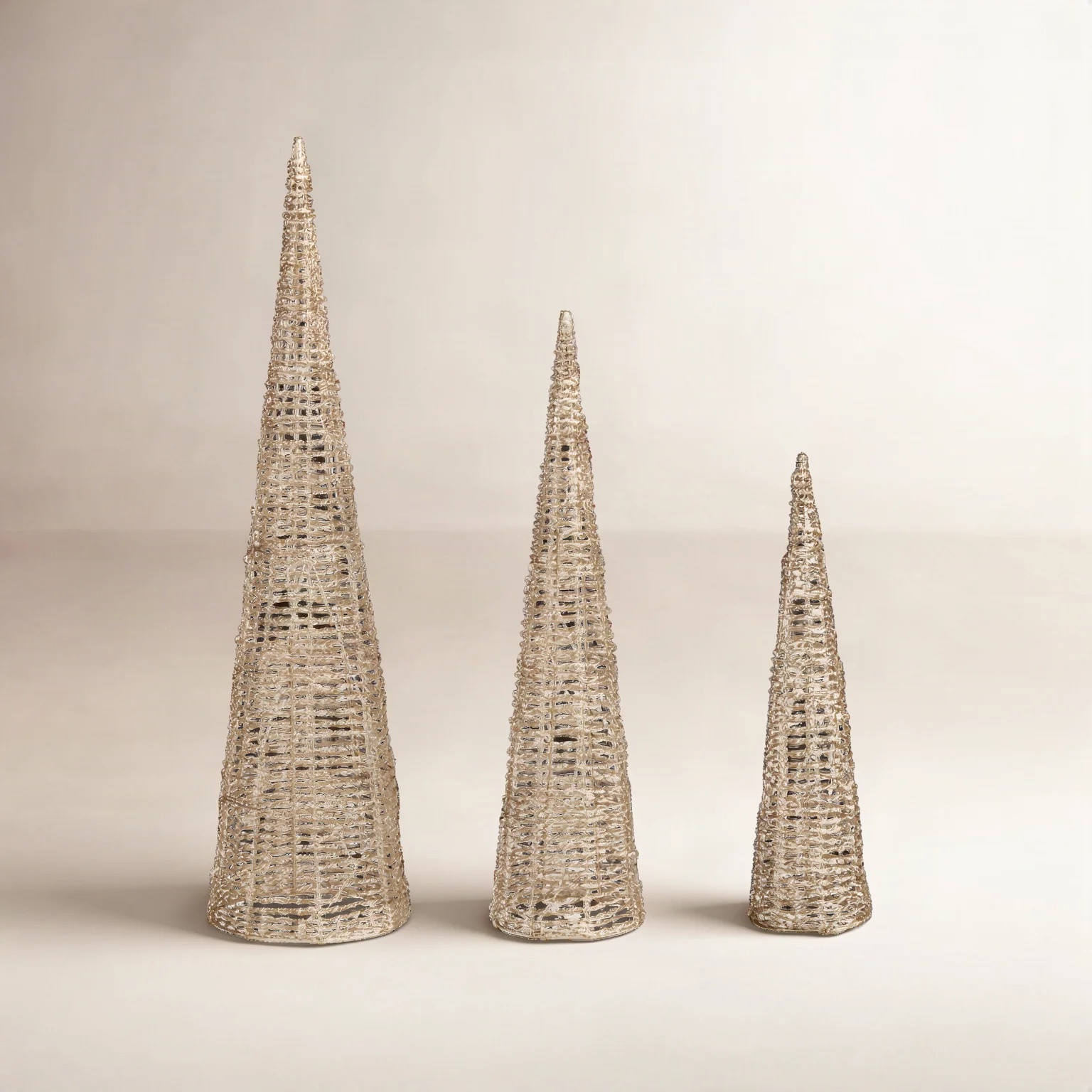 Set Of 3 Lighted Christmas Plastic Champagne Gold Cone Tree With 65 Warm White LED Lights | Wayfair North America