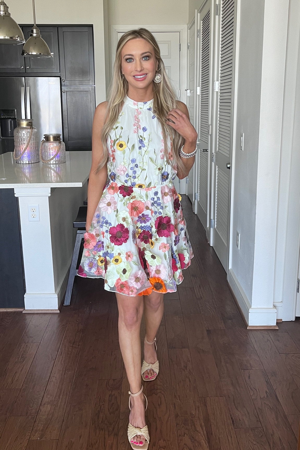 How fun is this floral halter dress?! 

#LTKFindsUnder100 #LTKSeasonal #LTKTravel