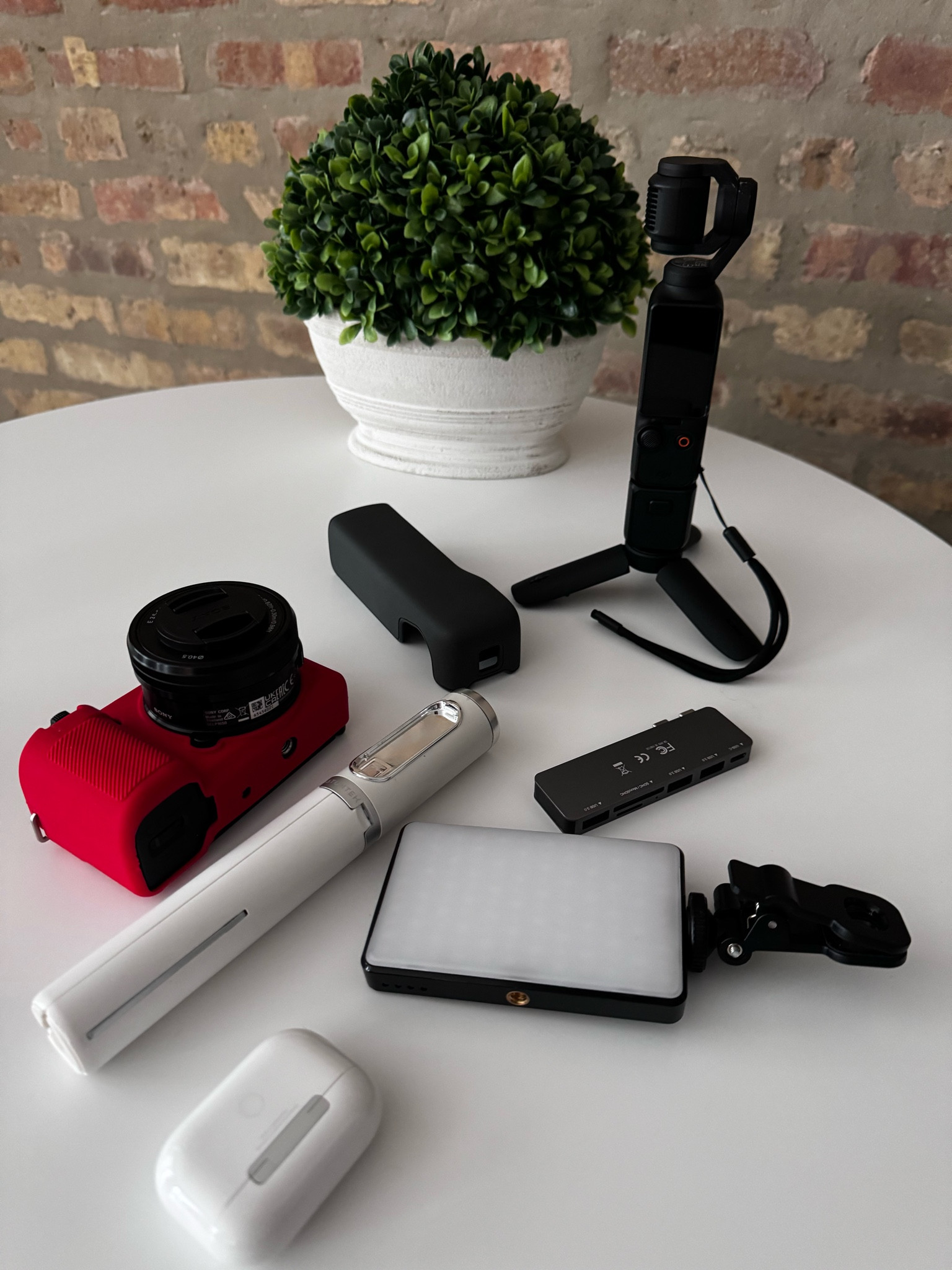 Tell me you're a content creator without telling me you're a content creator 😆 these are the cameras me and Nick use along with the best lights and tripod small enough to fit in (most) of my small purses 