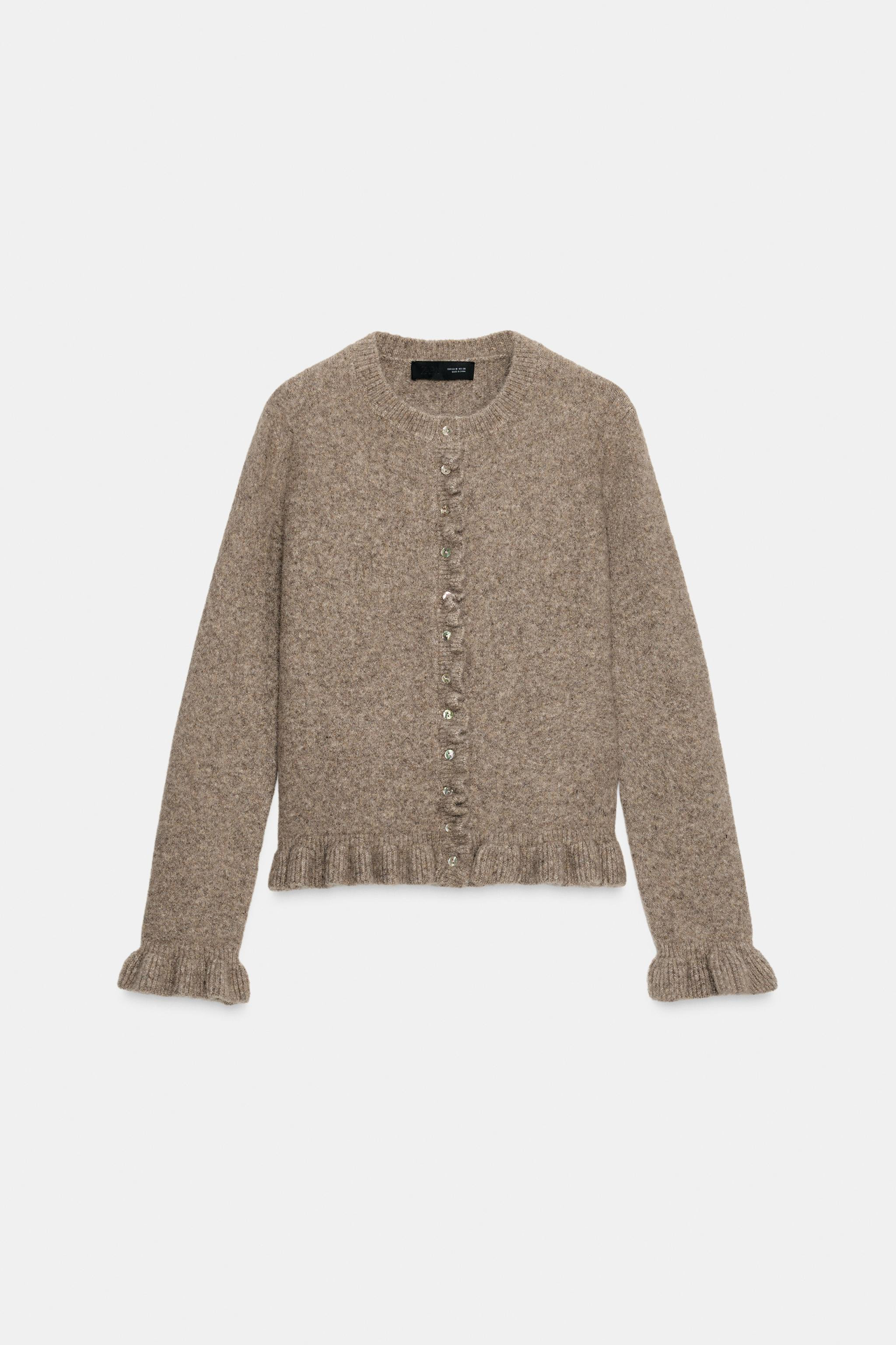 Smooth knit cardigan with round neck and long sleeves. Ruffled trim detail. Front button closure. | Zara US