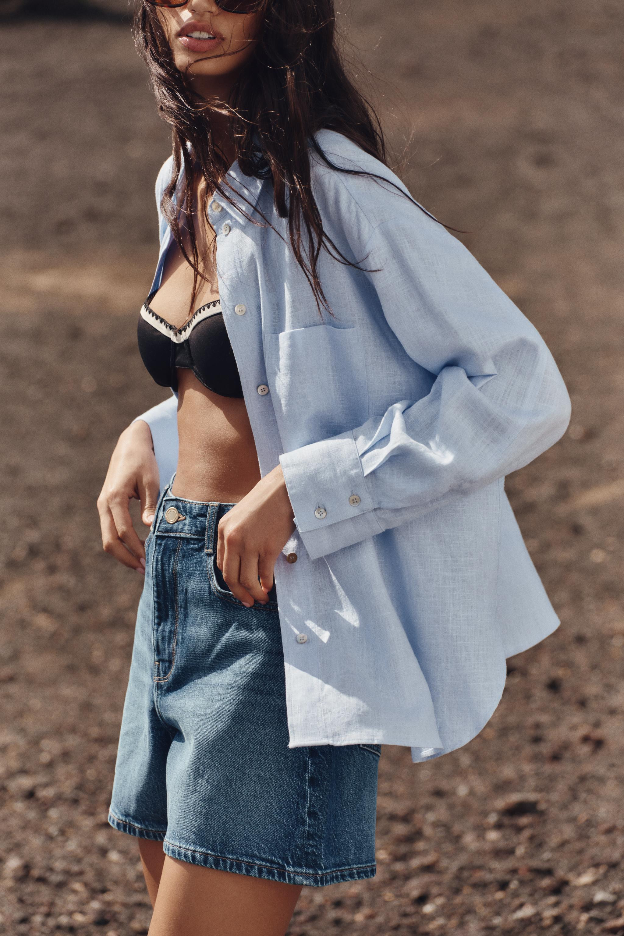 Loose-fitting linen shirt. Lapel collar and long sleeves. Front patch pocket. Hem with side vents... | Zara US