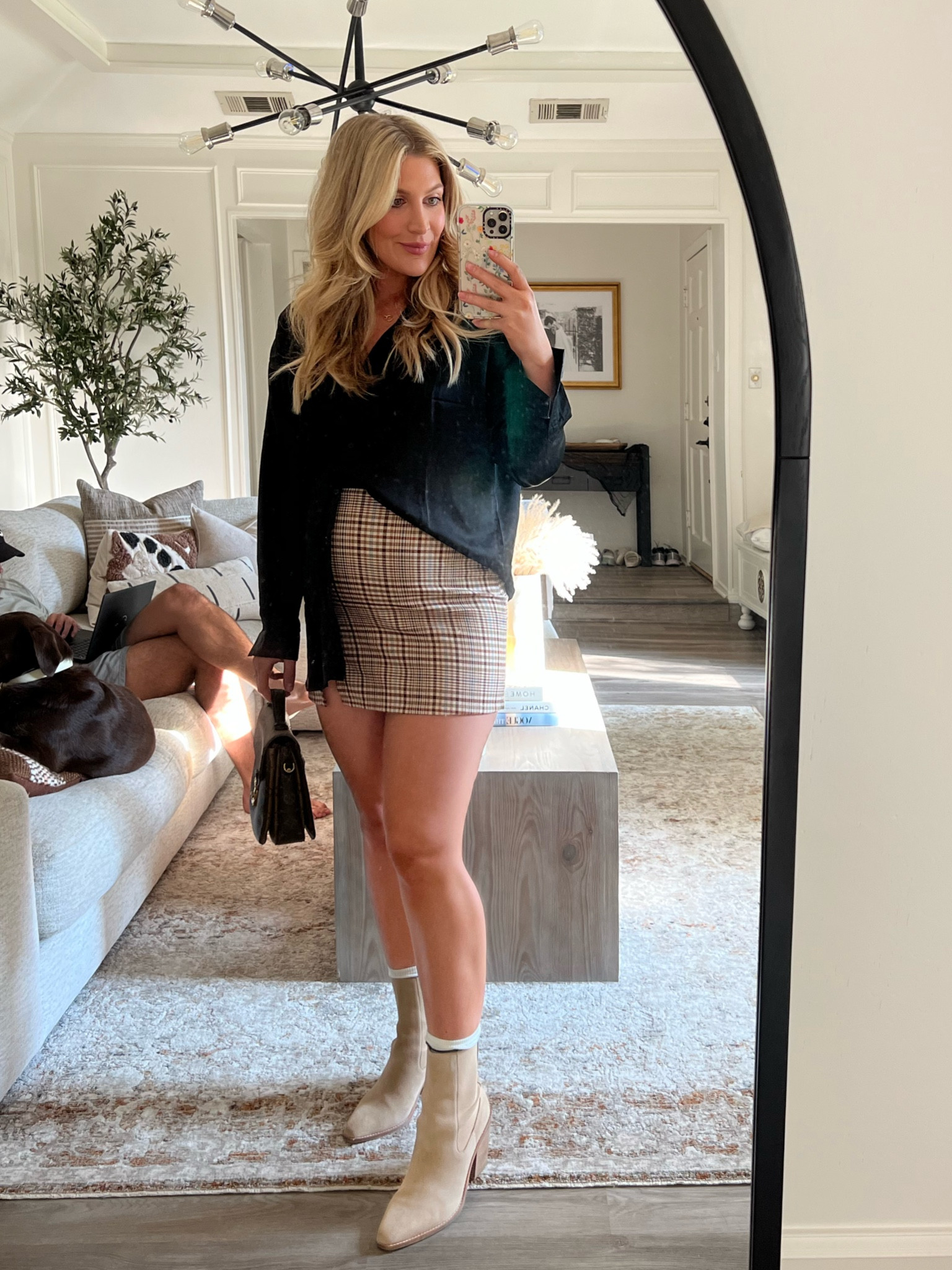 Fall bump / maternity style idea! 🤎 Wearing size large in the plaid skirt, black button up is oversized and great for pre and post pregnancy. Paired with suede booties on sale! 

#LTKbump #LTKSeasonal #LTKstyletip
