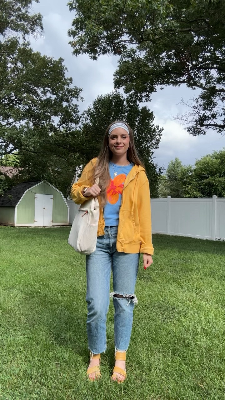 

7/16/25 ootd!

Sweatshirt: thrifted Gap
T-shirt: The Beach Club
Jeans: thrifted Zara
Jewelry and headband: Amazon 
Sandals: thrifted Free People

Light orange zip up front sweatshirt hoodie, drawstring hooded sweatshirt pullover, high mid rise jeans, minimal distressing denim Zara brand, raw hem frayed jeans, corduroy work bag office purse laptop bag, blue and orange color combination, floral print graphics on t -shirt, blue and white striped stretchy headband, affordable Amazon jewelry, gold heart locket, stone and gold cross necklace Amazon find, gold twisted hoop earrings, free people mustard yellow sandals, high ankle straps wrap around platform flatform sandals we the free

#LTKSaleAlert #LTKFindsUnder100 #LTKStyleTip