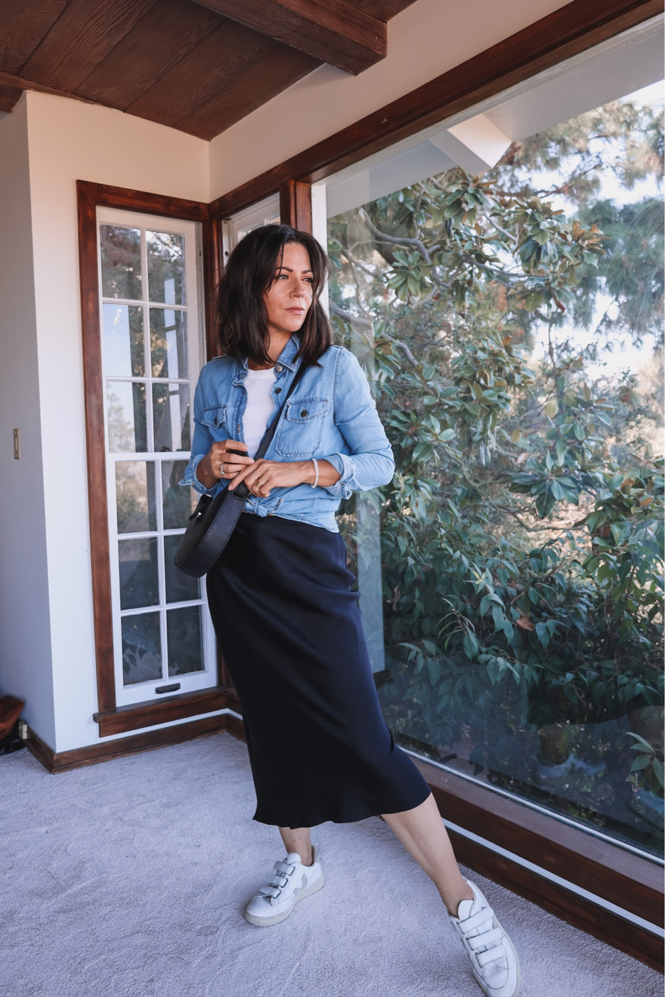 Styling this classic silk skirt in a more casual way with white Veja sneakers, a white basic tee, a jeans shirt and a crossbody bag.

Skirt: Anine Bing
Jeans shirt: Yes And
Tee: The Classic T-shirt Company
Bag: Matt + Nat
Sneakers: Veja

#sustainablefashion #slowfashion 



#LTKSeasonal #LTKstyletip