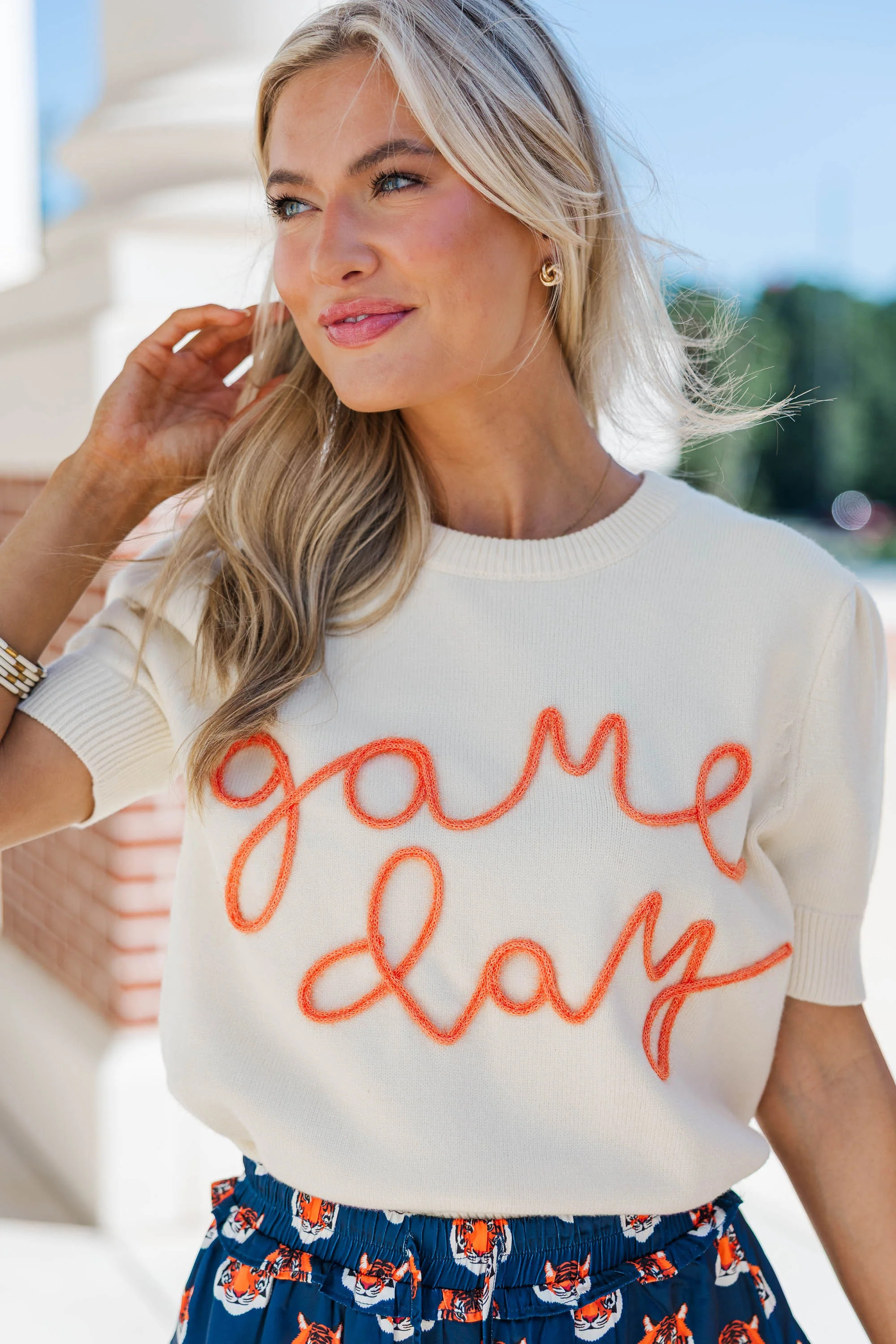 To The Stadium White and Orange Game Day Puff Sleeve Sweater | The Mint Julep Boutique
