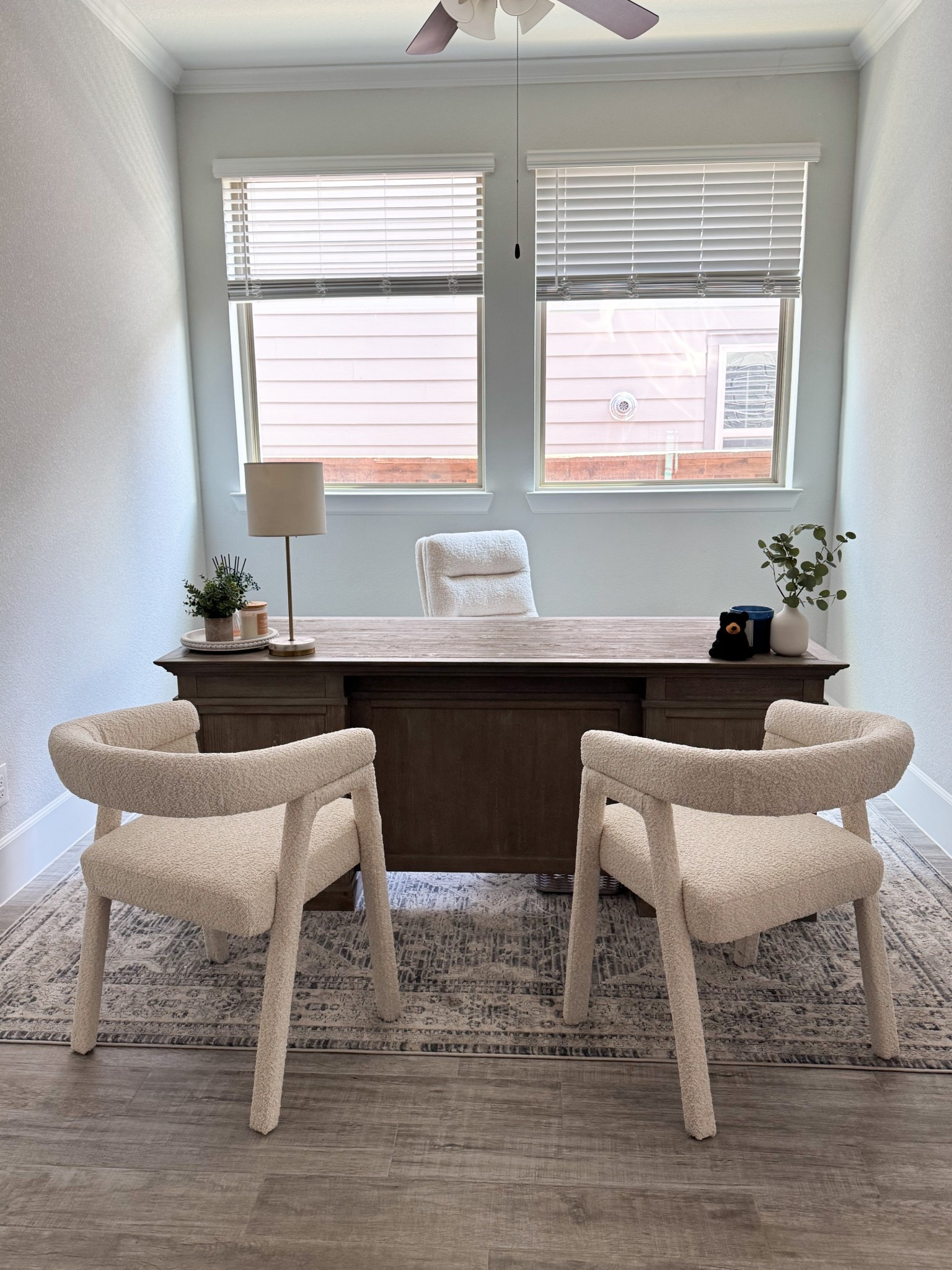 Obsessed with how cozy my office turned out! The bouclé chairs are super comfy and give the perfect texture, and the desk ties it all together. Simple, neutral, and feels so fresh.

#homeofficevibes #neutraldecor #officestyle #cozyminimalism 

#LTKHome