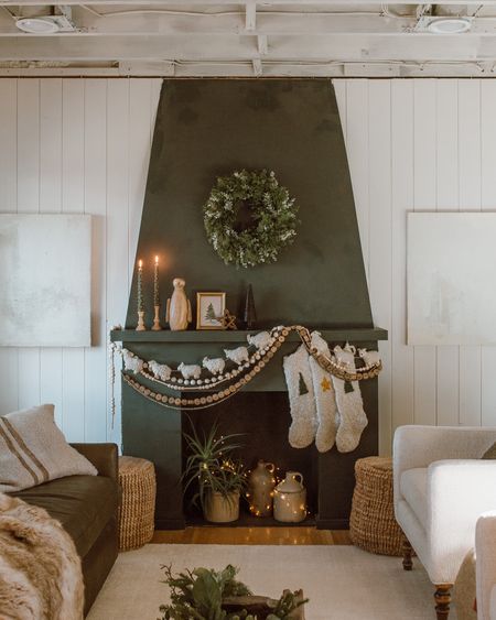 Our little cozy + whimsical Christmas fireplace 🥲🥹 i must say, this room is becoming my FAVORITE room in the house this season. It’s SO cozy! It may or may not have something to do with my adorable sheep garland I made and my cute tree tapers. 😆 

#christmasfireplace #christmasdecor #holiday2022 #christmas2022 #holidayinspo #ighome #christmasinspo #bhghome #fireplaceinspo

#LTKSeasonal #LTKHoliday #LTKhome