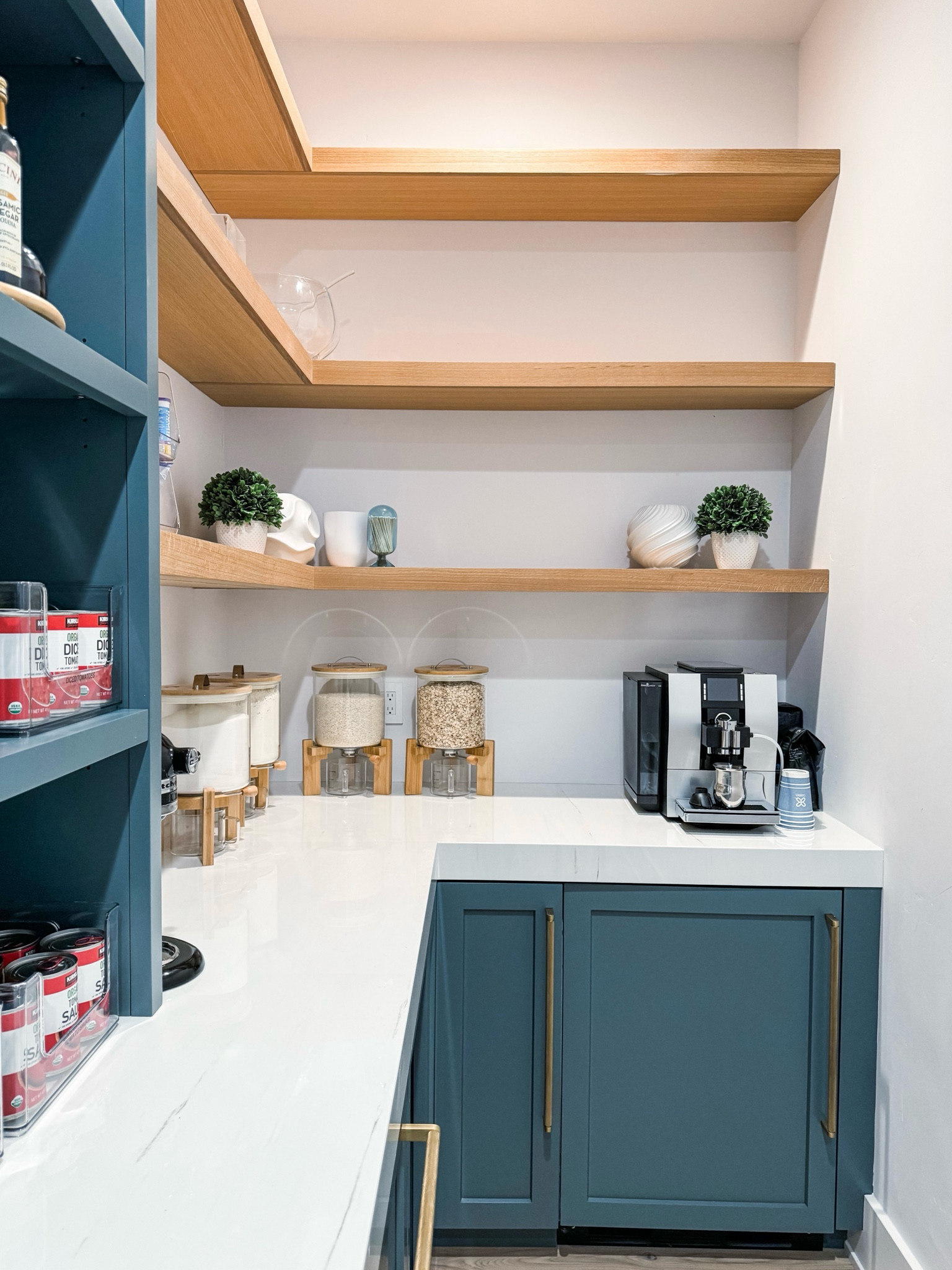 This week I had the pleasure of organizing the most stunning kitchen and pantry! In the process I was able to help this family get settled before hosting their first Christmas in their new home. 🤍

I discovered these insanely beautiful glass food storage containers recently, and there was no better place to finally have the opportunity to use them but in this pantry. Mom opted to have four on the counter; one for rice, oatmeal, flour, and sugar.

These are airtight, sit on a wooden stand, come in two sizes, and include a measuring cup as well! These truly are special and unique!

#LTKfamily #LTKstyletip #LTKhome