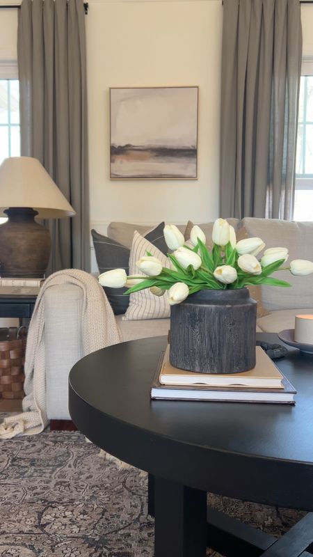 Spring decor | home decor for spring | Walmart planter | Walmart finds | faux tulips | Amazon faux tulips | Amazon finds | coffee table decor | neutral throw pillows | coordinating rug and throw pillows | gray curtains | brown lamp | rustic lamp | coffee table 

#LTKfindsunder100 #LTKhome #LTKfindsunder50