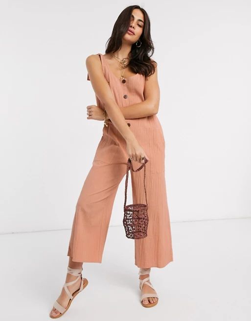 ASOS DESIGN lounge tie shoulder crinkle button front jumpsuit in rust | ASOS (Global)