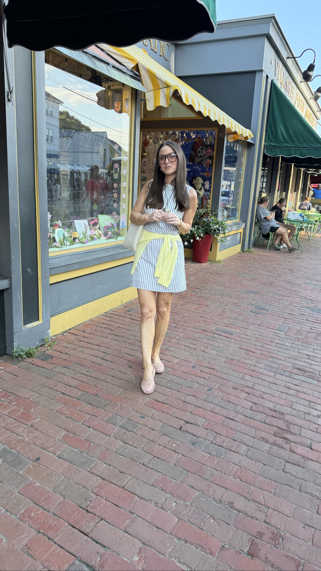 Outfit of the night on our family vacation. Can’t believe this dress is $32!! I did my true size. Cardigan is the perfect pop of color. Also true to size as are the shoes 🤍

#LTKootd #LTKOver40 #LTKSeasonal