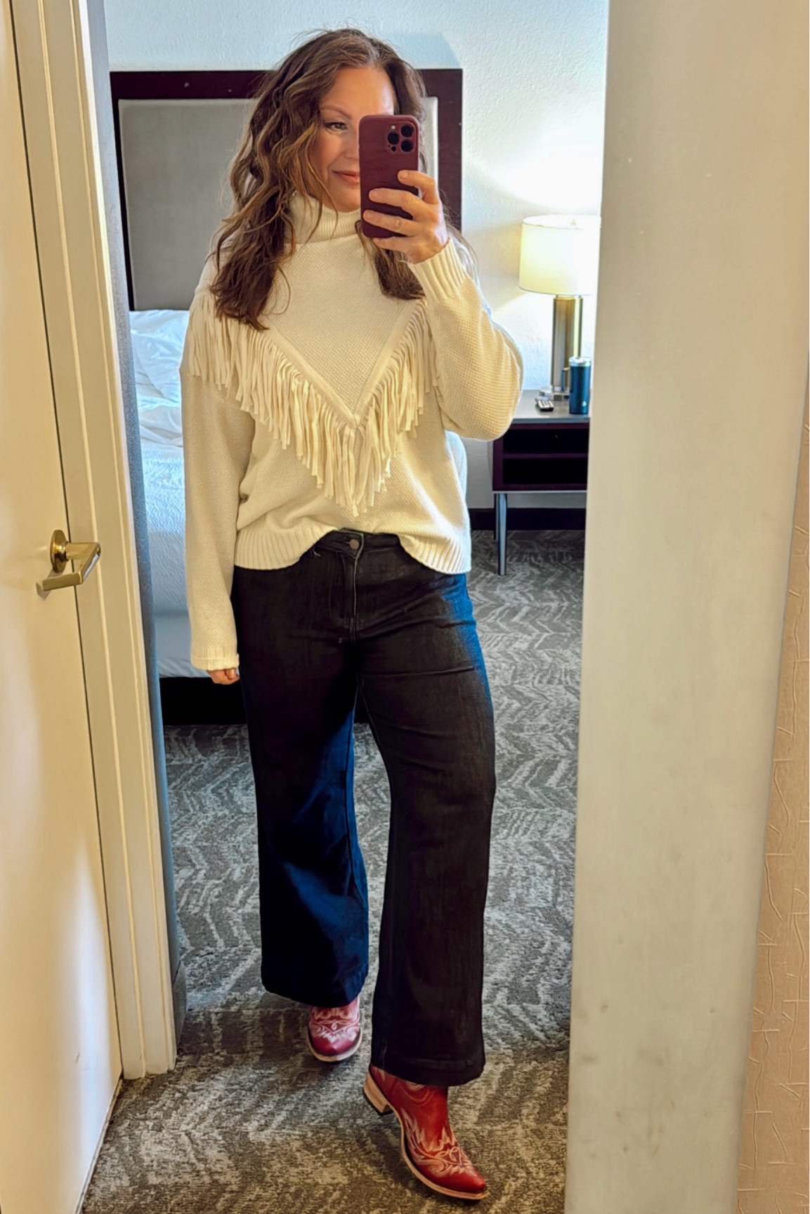 The Cake Bake Shop OOTD
Lipstick: “Black Honey”
Boots: TTS
Sweater: large
Jeans: 12

Western style
Red cowboy boots
Lane boots
Wide leg jeans 
Fringe turtleneck sweater

#LTKMidsize #LTKHoliday #LTKSeasonal