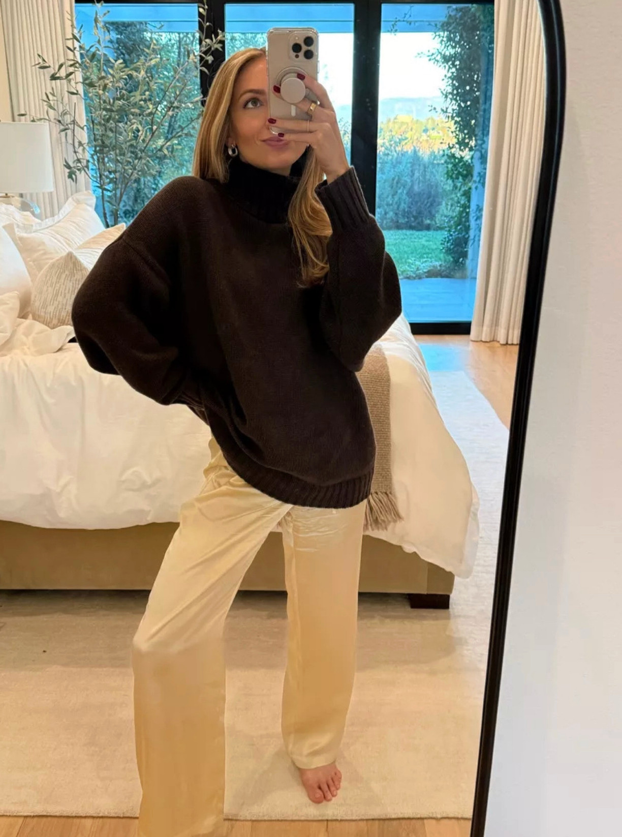 Coziest winter look I wear at home and also out to dinner - the ivory silky pants are a winter closet staple to dress up or down. Paired them with this cozy brown Jenni Kayne turtleneck sweater ❄️  

 #LTKHoliday #LTKgrwm #LTKootd