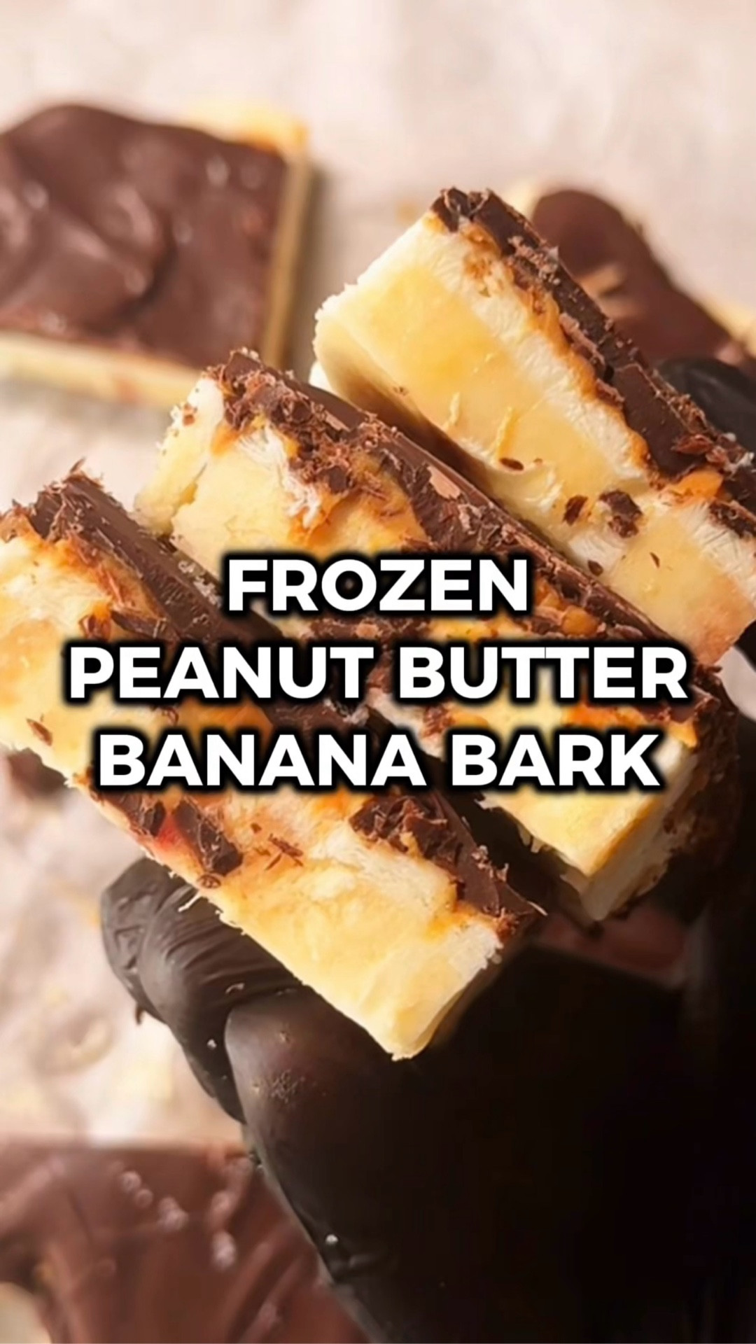 This frozen peanut butter banana bark is the easiest homemade dessert and it keeps me from spending hella money on late night delivery bad decisions 😆

You just layer banana slices, yogurt, peanut butter, and dark chocolate on a sheet pan and toss it in the freezer. Two hours later you've got this crunchy, creamy, chocolatey bark that you can break into pieces whenever you're craving something sweet. SO good straight out of the freezer.

Would you try it? Let me know in the comments what you think if you do! 🙌

INGREDIENTS
2 bananas (sliced)
1/4 cup vanilla yogurt
1/4 cup peanut butter (warmed)
5 oz dark chocolate melting wafers (melted)
sea salt (optional; to taste)

INSTRUCTIONS
1️⃣ Slice the bananas and arrange the pieces on a pan lined with parchment paper, placing them so they're all touching to form a base for the bark.
2️⃣ Spread the yogurt evenly over the top.
3️⃣ Add the peanut butter to a microwave safe bowl and heat for 30 seconds or until runny. Drizzle it evenly over the yogurt layer with a spoon.
4️⃣ In another microwave safe bowl, add the chocolate melting wafers. Heat for 45 seconds, take it out, and stir until smooth. If needed, pop it back in at 10 second intervals and stir until totally melted. Drizzle over the peanut butter layer and use the back of a spoon to carefully smooth it out.
5️⃣ Freeze for 2 hours or until totally solid. Break into pieces and dig in.
6️⃣ Enjoy!

#LTKHome #LTKfoodie