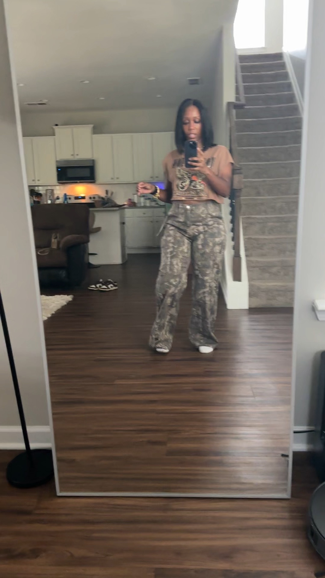 How to style camo cargo wide leg pacts with a brown graphic tee

#LTKOver40 #LTKPetite #LTKootd