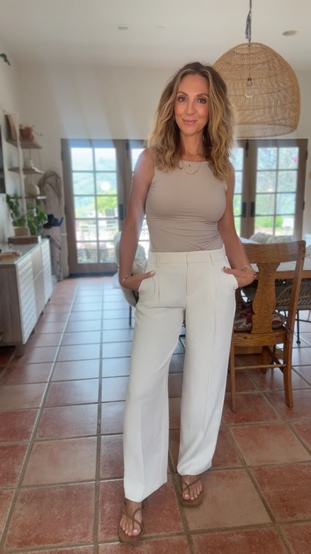 Target Workwear Finds That Look Expensive

These cream crêpe trouser pants from Target are one of those pieces that instantly make an outfit look elevated and expensive while still being unbelievably comfortable. The fabric is lightweight and breathable for summer, but still has that polished tailored look that works so well for business casual workwear, office outfits, teacher outfits, dinner plans, or everyday elevated basics. They’re the kind of summer pants you can style so many different ways and wear on repeat.

I have them styled here with my absolute favorite seamless tank top from Target. It’s stretchy, fitted, and long enough to tuck in perfectly without constantly coming untucked. Because it’s seamless, it lays so smoothly under pants and layers so well for workwear outfits or casual summer looks. I own it in multiple colors because it’s one of those basics you end up reaching for constantly.

I also paired the look with these minimal suede strap sandals from Target that give such an elevated designer-inspired feel. They’re simple, chic, and go with everything from trouser pants to dresses and denim.

Honestly @Target has been so good lately for affordable fashion, elevated basics, summer outfits, neutral outfits, business casual looks, vacation outfits, and effortless pieces that look way more expensive than they are. Everything is linked in my LTK 🤍

#LTKOver40 #LTKootd #LTKstorytime