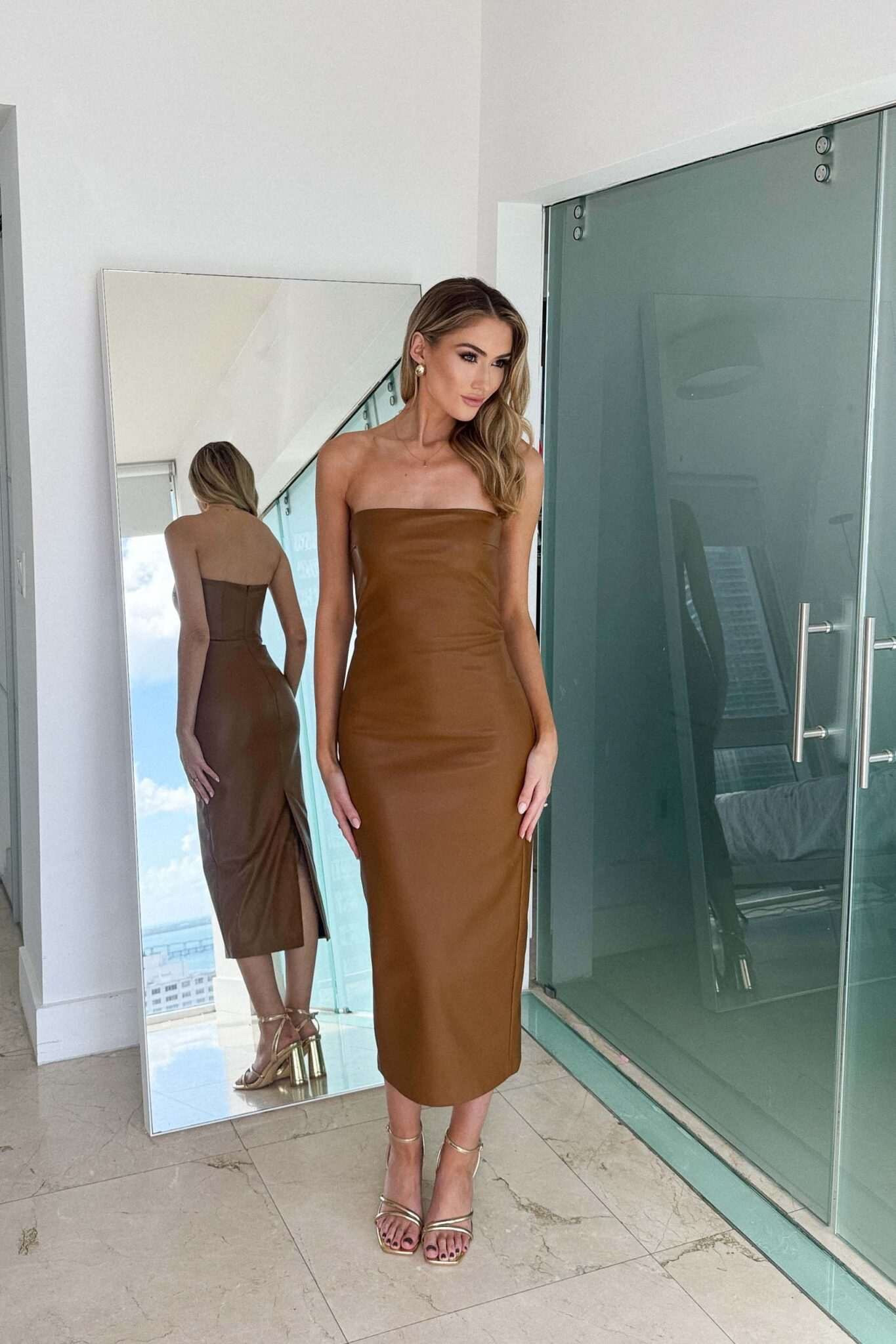Obsessed with this brown leather dress! Wearing a small. Tags: CultNaked Killa Faux Leather Dress, Gold Block Heels
Leather midi

#LTKStyleTip