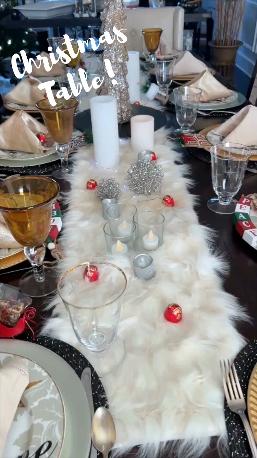 So fun to set a #christmas 🎄 table.  I've used my standard Christmas tableware mixed with more contemporary snowflake ❄️plates.  There's a mix of linen & gold satin napkins and 2 different goblets all with this winter wonderland theme on the table.  
I pulled out my grandmother's silver, but you can certainly use whatever you have.

Cute tips...plant a treat (in this case a small chocolate under the napkins for each guest.  I also provided an inexpensive ornament at the place settings for each of them to take home.

Complete the full experience by using chargers and/or decorative placemats.

Light the candles (batter operated 😉) and you're ready. 

 #LTKHoliday #LTKfoodie #LTKHome