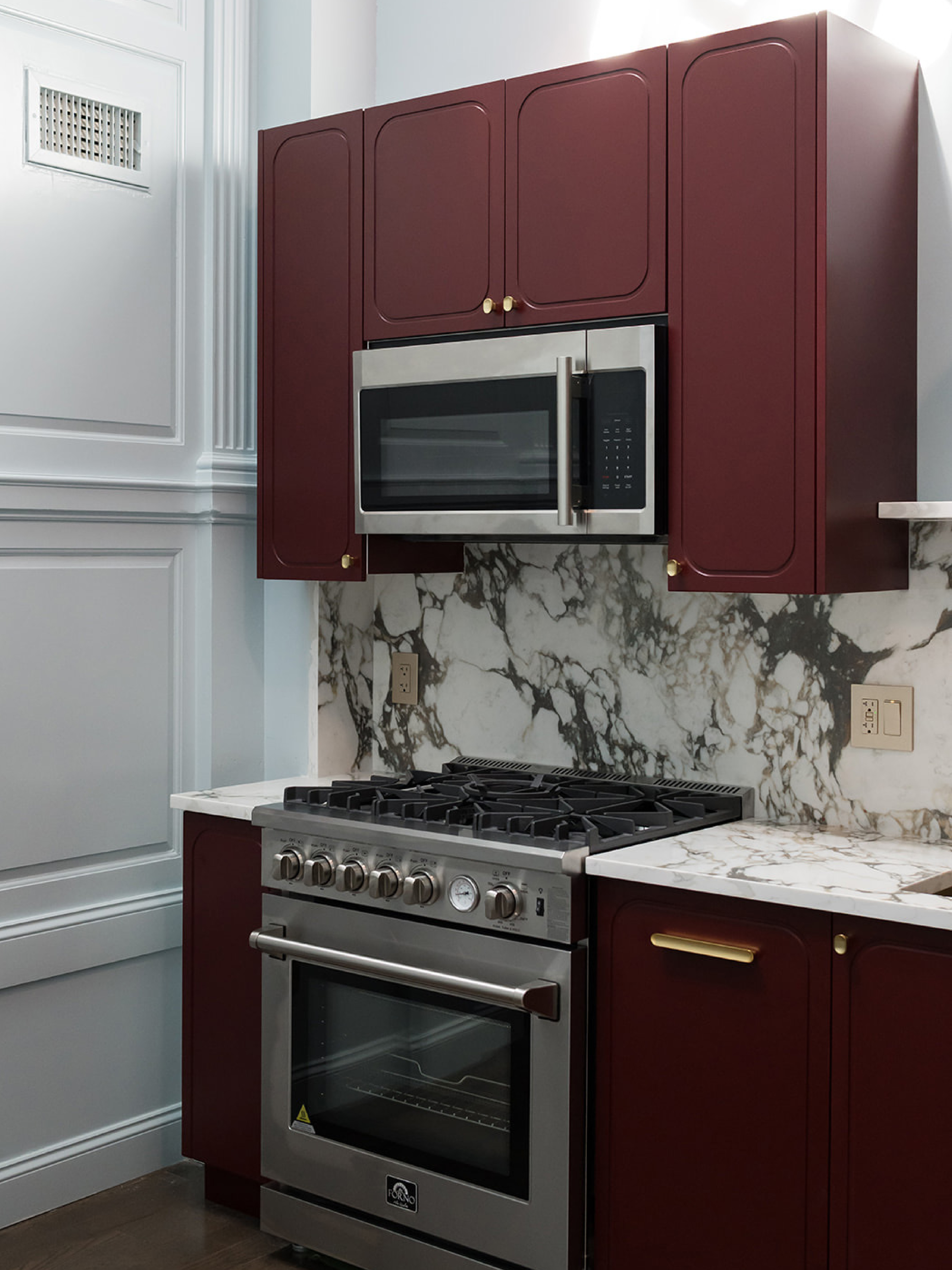 it's time for a kitchen close up at this #dwelloctoberstudo project! the kitchen footprint was limited, so we kept the same cabinet layout, but updated it with new @ikea boxes combined with beautiful curved cabinet fronts from @fronteriors. to make the kitchen feel more luxurious, we used a boldy veined quartz for both the counters and the backsplash, opting for a full-slab backsplash with a ledge above the sink. #dwelloctober

#LTKHome