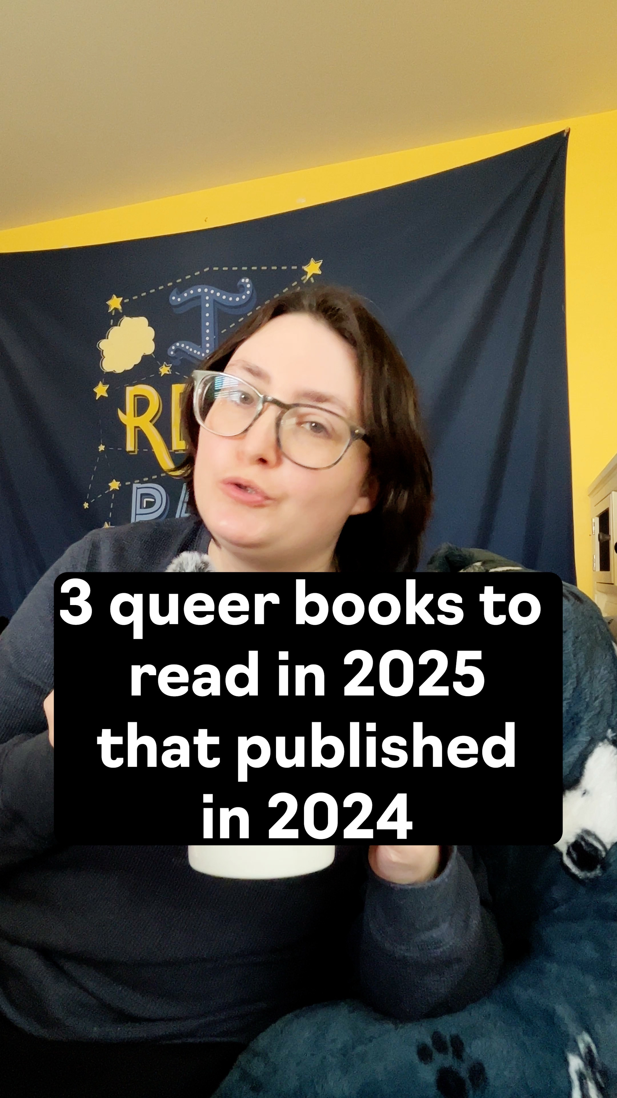 Recommending THREE queer books that published in 2024 you should read in 2025! 

•Here We Go Again by Alison Cochrun - An adult second chance romance road trip book between two girls who dated in high school who go on a road-trip to Maine with their high school English teacher who is dying of cancer. (Will make you sob.)

•Bury Your Gays by Chuck Tingle - A gory and disturbing queer horror about Hollywood, the “bury your gays” trope. Audiobook was fantastic! 

• Playing for Keeps by Jennifer Dugan - A YA sapphic rivals to lovers romance between an umpire and pitcher; centers grief; messy queers


Video description: A video of Alex, a white trans man wearing round framed glasses and a navy blue long sleeve shirt sitting on his bed beside a reading pillow. Alex is holding a mug from Queer Liberation Library. He comes into frame and starts talking while holding a small microphone. End of Video description.