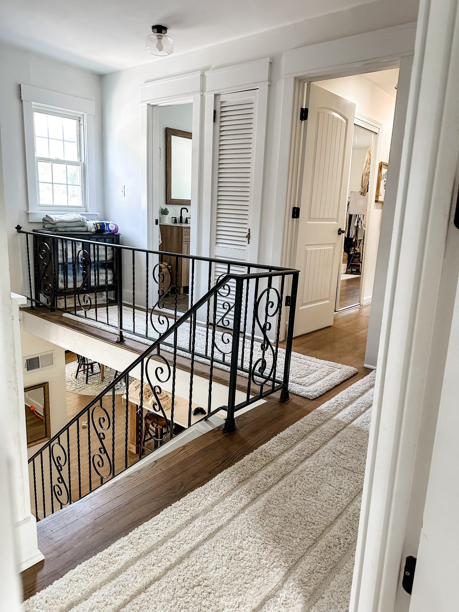 My upstairs hallway. If you have runner, you need the rug pad I have linked. It’s the games changer  

#LTKHome #LTKFindsUnder50 #LTKSummerSales