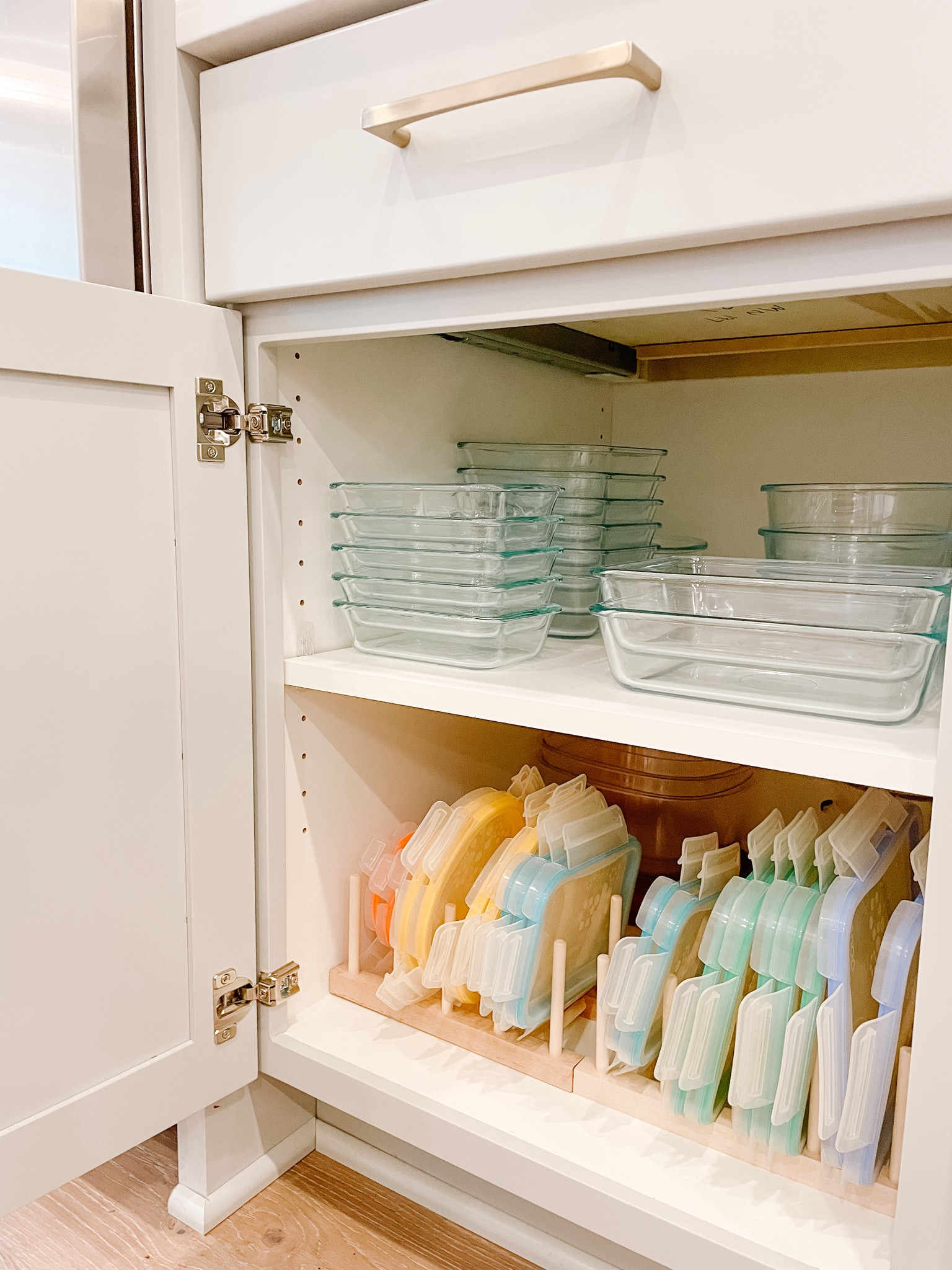 Organizing Tupperware doesn’t get much better than this wooden organizer.

Organized kitchen.
Kitchen organization.
Organizing Tupperware.
Food storage.
Home organizing. 


#LTKfamily #LTKfindsunder50 #LTKhome