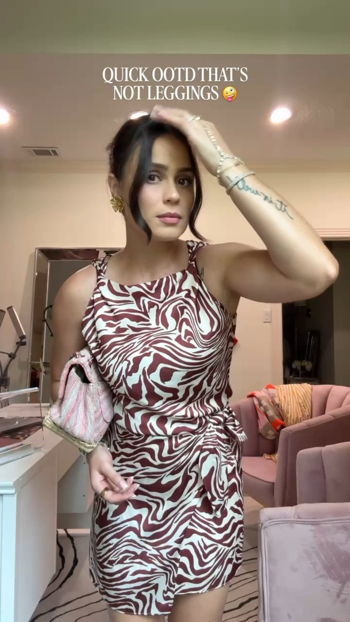 Zebra print is having a moment and I'm not mad about it. 🖤 Tanya Taylor's Penny Top and Lydia Skirt set — that swirl print does all the work, so I kept everything else simple with neutral sandals. This is the kind of set that photographs like a dress but gives you two pieces to actually wear separately. Linked some similar options, too. 

 #LTKgrwm #LTKootd