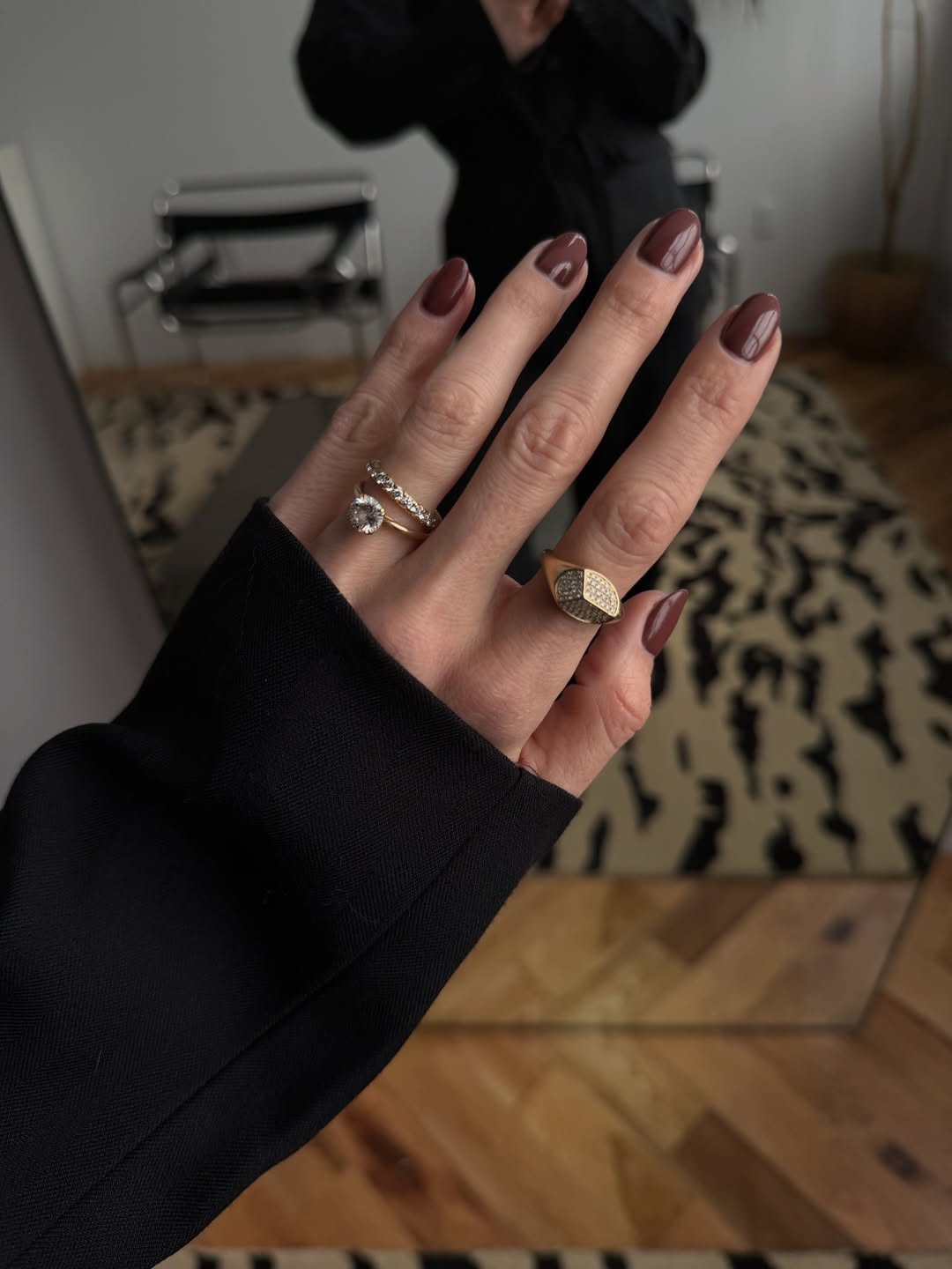 Yellow gold rings paired with chestnut red-toned nail polish. 

 #LTKgrwm #LTKootd #LTKWorkwear