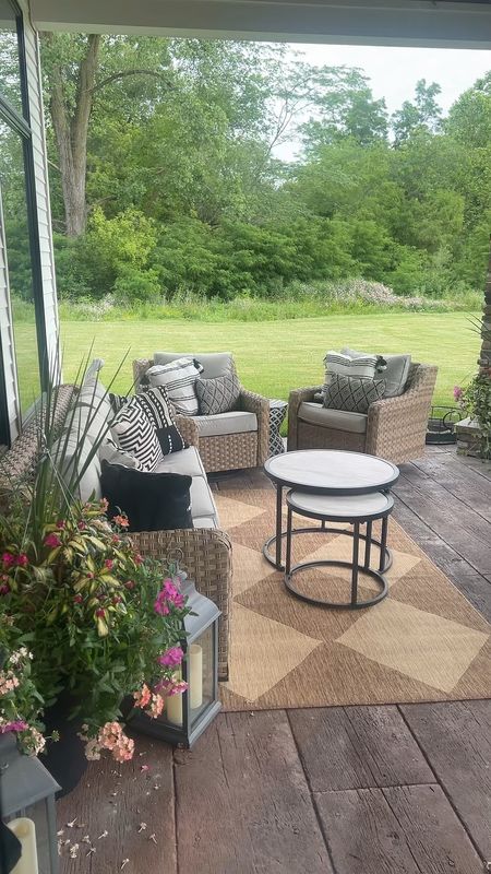 Neutral black and white affordable patio decor, outdoor furniture, styled patio, styling a patio, black and white porch furniture 

#LTKHome #LTKSeasonal