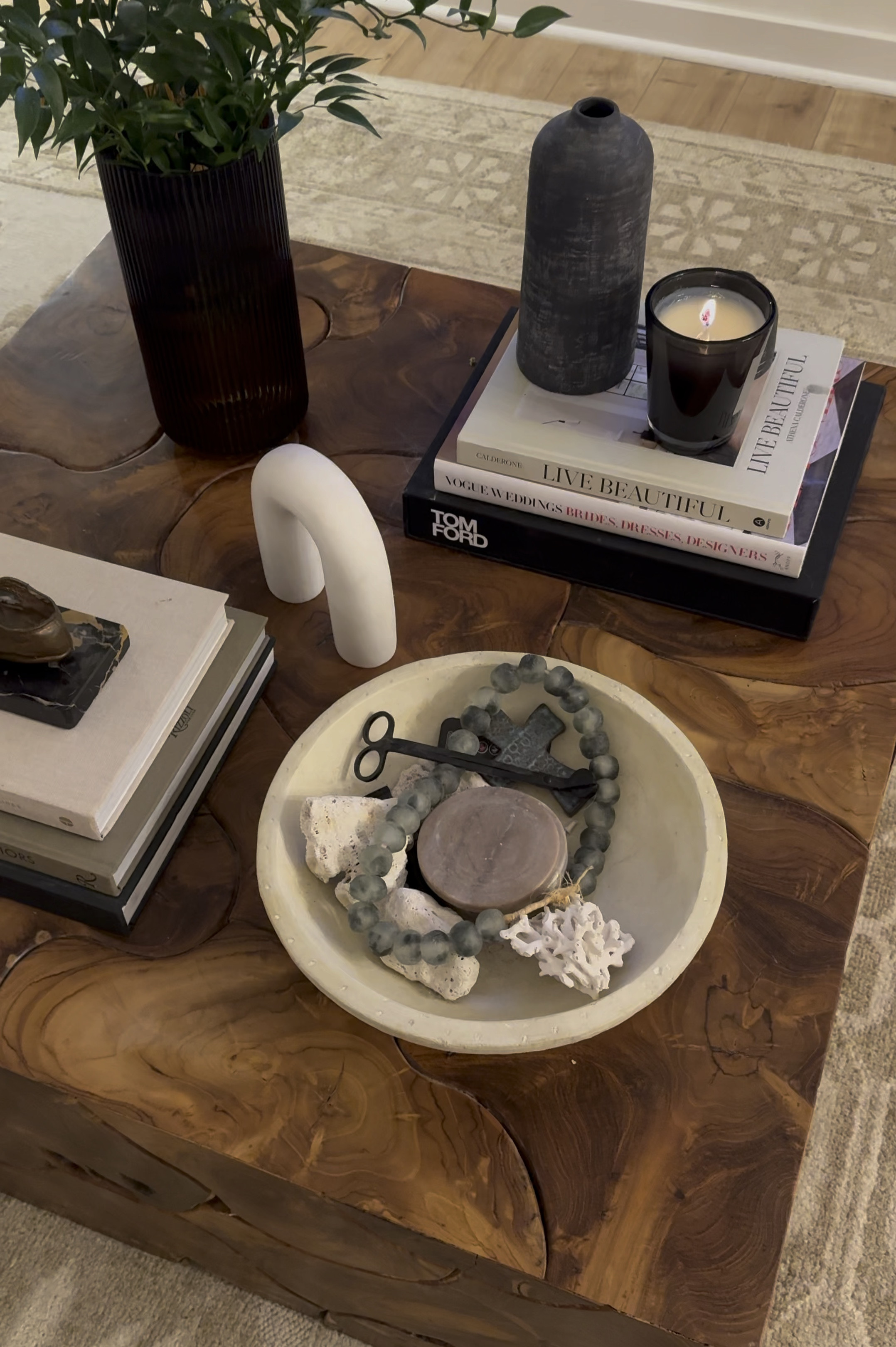 Current Coffee Table Styling | when shopping for home decor, I look for organic textures like marble, wood, and linen. Textures bring out personality in neutral color styling. Pictured are my favorite coffee table books, bowls, candles and vases. Amazon and Target mixed with antique/vintage pieces. 

#LTKhome