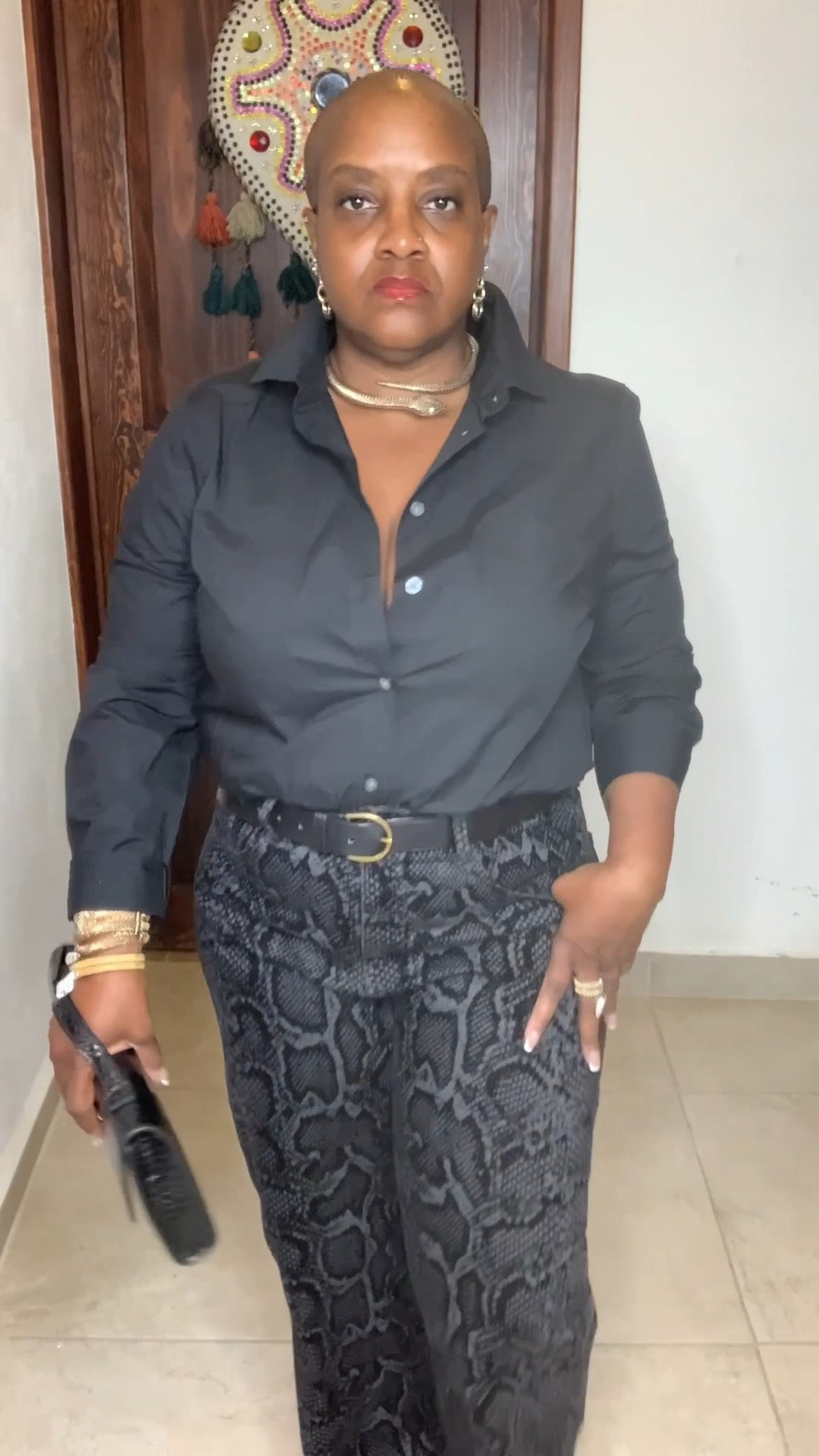 The black button-down is one of the most overlooked closet staples, but it’s truly a must-have! It’s sleek, versatile, and works with so many different styles.

I styled my favorite black button-down from Express.com in two ways:

✨ With snakeskin-textured wide-leg jeans from Zara for an edgy yet chic vibe
✨ With my custom-made maxi skirt from Ghana for an elegant, timeless look

This top is a true closet workhorse—you can dress it up or down effortlessly!

Follow me on LTK for more classic and versatile style inspiration!

#closetstaples #fashionover50 #styleover50 #buttondownshirt #blackbuttondown #effortlessstyle #capsulewardrobe #chicandtimeless #womensfashion #maturefashion #agelessstyle #versatilestyle

#LTKOver40 #LTKStyleTip