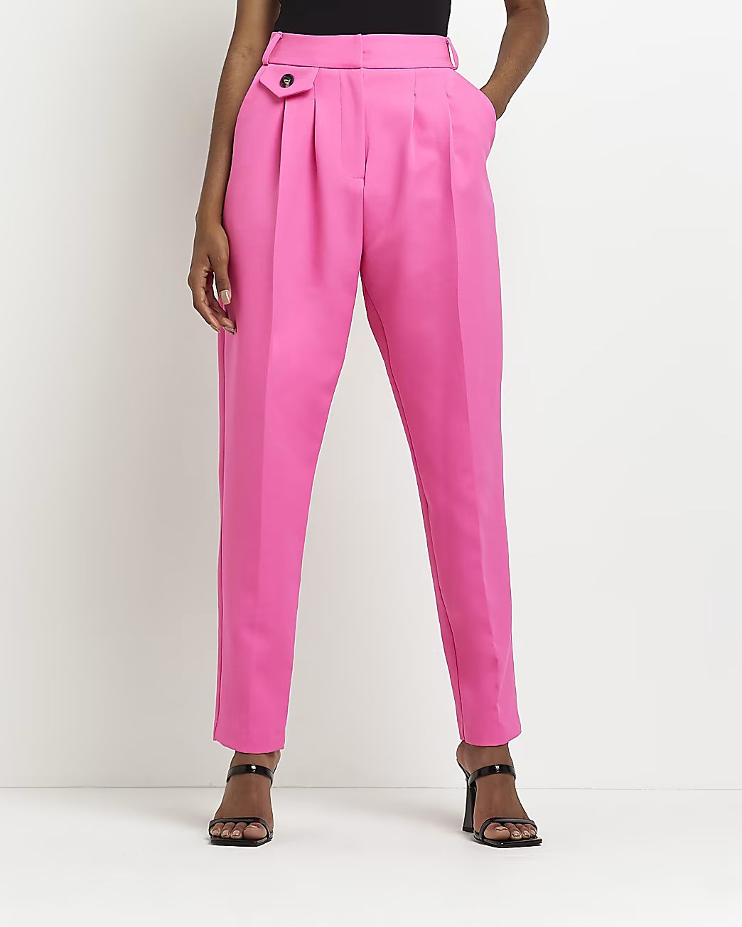 Pink pleated tapered trousers | River Island (UK & IE)