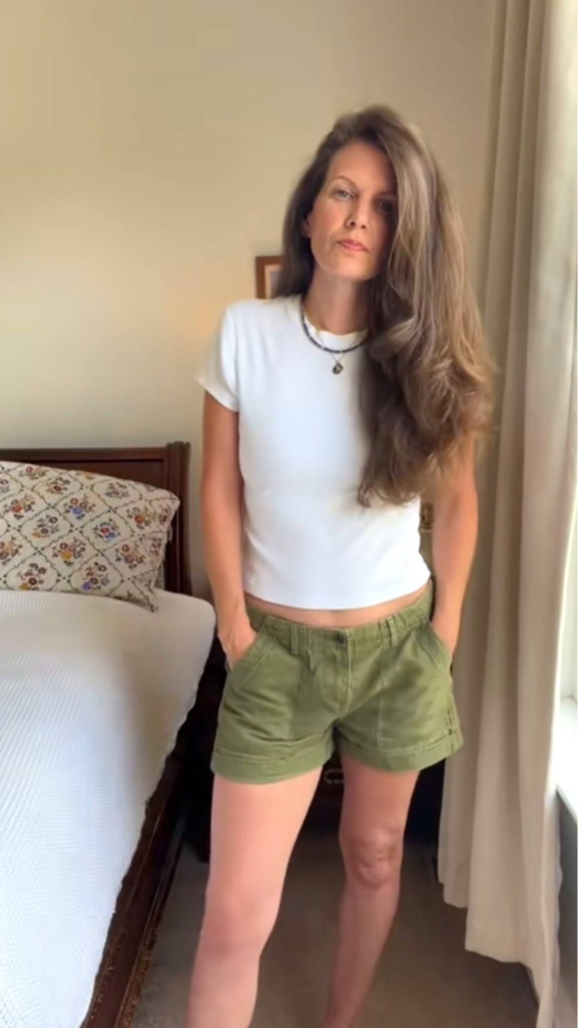 Green utility shorts, a basic white cropped tee, and bare feet because grounding is one of my favorite things.
This outfit is everything I love. It's easy, laid-back, a little beachy. It's the kind of style I'll never get tired of. Reminds me of 90s California, laid-back, beachy, and carefree.


#CaliforniaStyle #90sStyle #easystyle
#CasualStyle #granolagirl

#LTKootd #LTKOver40 #LTKmomlife