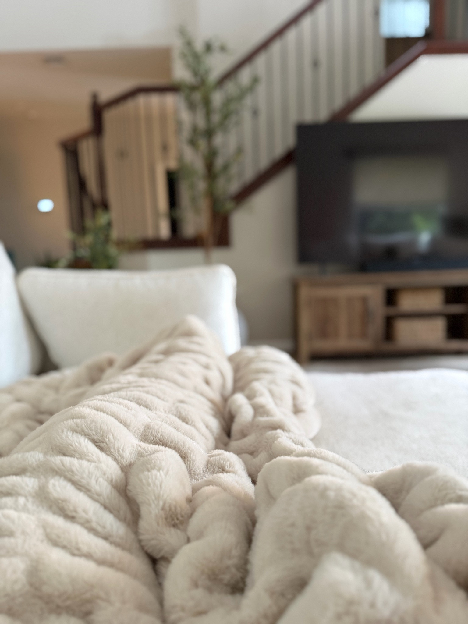 My spot. Go in on this blanket as a gift with friends or family for someone else you love.  It’s pricey but a game changer. A bunch of my friends went in on this as a house warming for me and I’ll be eternally grateful! I have the antique ivory in XL. MAGICAL ✨ also, my couch is a 10/10 recommend.

#LTKHome #LTKselfcare #LTKmomlife