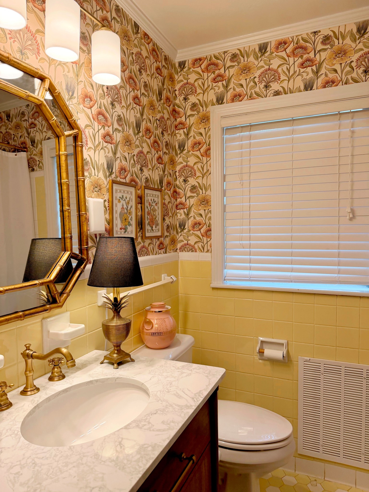 When I saw my house for the first time, it was when I was shopping the estate sale after its previous owner passed away.

I fell in love with many many things about the house. And I definitely loved the original yellow tiles. Because it’s currently the main bathroom until I hopefully one day add on a larger bathroom for me, I want it to be pretty, guest-ready, but functional for me!

I switched out the vanity for a larger one, replaced the vanity lights for better glow, hung a vintage bamboo mirror, and added some great art and other pieces that could withstand the bathroom environment. But I’ve always envisioned a wallpaper that tied the yellow tile in!

@artscape_design_studio ‘s Cosmos completely transform the space. It’s even more happy and vibrant than it was before. I chose traditional paste the wall since it’s a bathroom occasionally humidity.

You can shop the wallpaper by comments COSMOS, and I’ll send you the link to my LTK! 

#storykeeperstyle  #oldisgold 
•
•
•
•
•
•
•
Vintage Decor | Home Inspiration | Collected Home | Traditional Home | Sentimental Style | Curating Joy | The Sentimental Decorator | Joyful Rituals of Home | Sentimental Home | Homes with a Story

#thesentimentaldecorator #meaningfulhomedecor 
