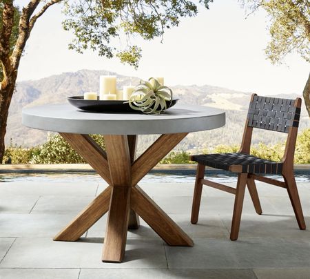 LINK IN BIO Abbott Concrete and Acacia Round Outdoor Dining Table The rugged, casual look of concrete provides a perfect backdrop for outdoor entertaining. Our table’s eco-friendly, solid Acacia wood base creates a handsome contrast. On Sale! Grab Yours Here: https://bit.ly/3uEsc3O  #outdoorlife  #outdoordining  #outdoorliving  #outdoorcooking  #outdoorentertaining  #BackyardGoals  #backyarddesign  

#LTKSpringSale #LTKhome #LTKstyletip