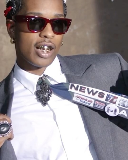 ASAP Rocky in Billboard wearing Ray-Ban shades, and @AWGE suit, shirt & tie.

#LTKMens #LTKStyleTip #LTKVideo