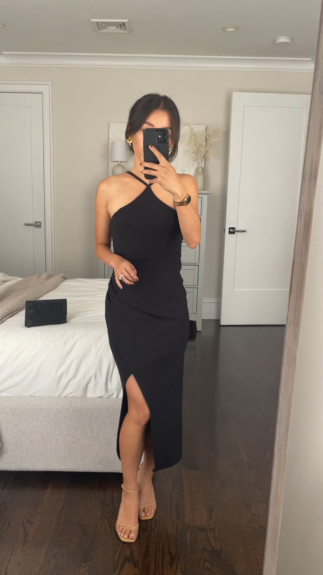 On sale for under $70 ~ Petal and pup little black dress with halter neckline and adjustable back straps. @nordstrom #nordstrompartner

Size 0 is a slim fit on me. Stretch crepe like fabric with a gathered faux wrap front. Love the longer midi length with flattering leg slit 

Wearing this with my Bristol 6 nippies 

Holiday style, little black dress, cocktail party dress, winter classic wedding guest style 

#LTKParties #LTKWedding #LTKHoliday