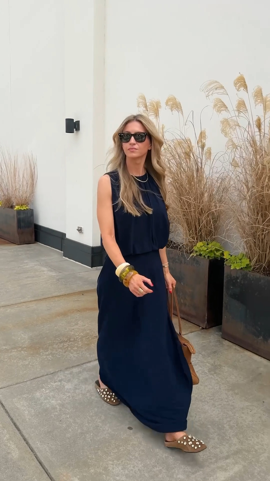 Navy skirt set for my hair appt. 

Navy tank: TTS, wearing a S
Navy maxi skirt: runs TTS, wearing an XS
Rhinestone suede flats: TTS 

#LTKgrwm #LTKootd #LTKspringtrends