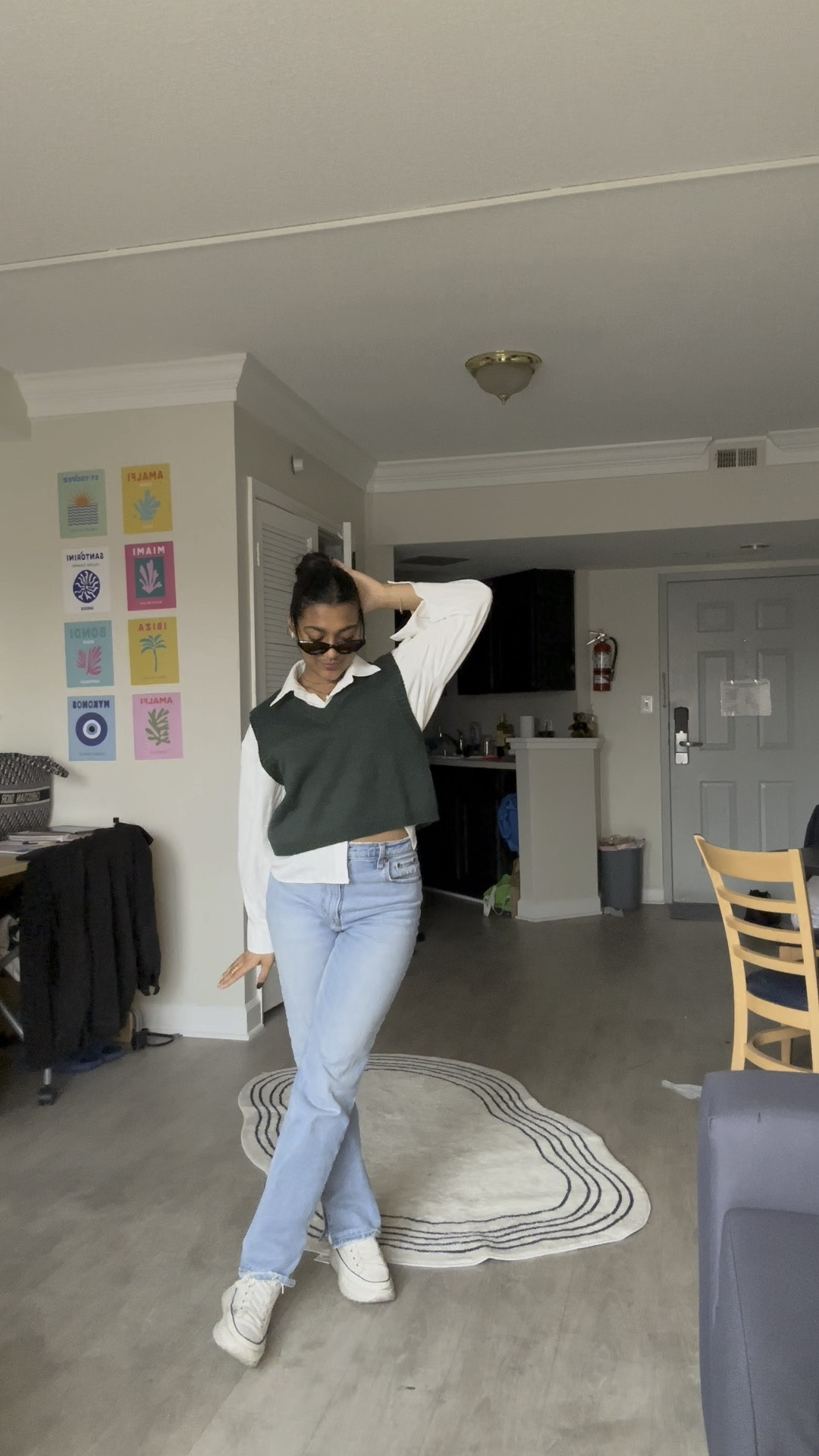 slicked back updo, green sweater vest, Abercrombie 90’s jeans, button up shirt, work shirt, business casual, casual outfit, minimalist look, accessoriess

#LTKVideo #LTKfindsunder50 #LTKworkwear