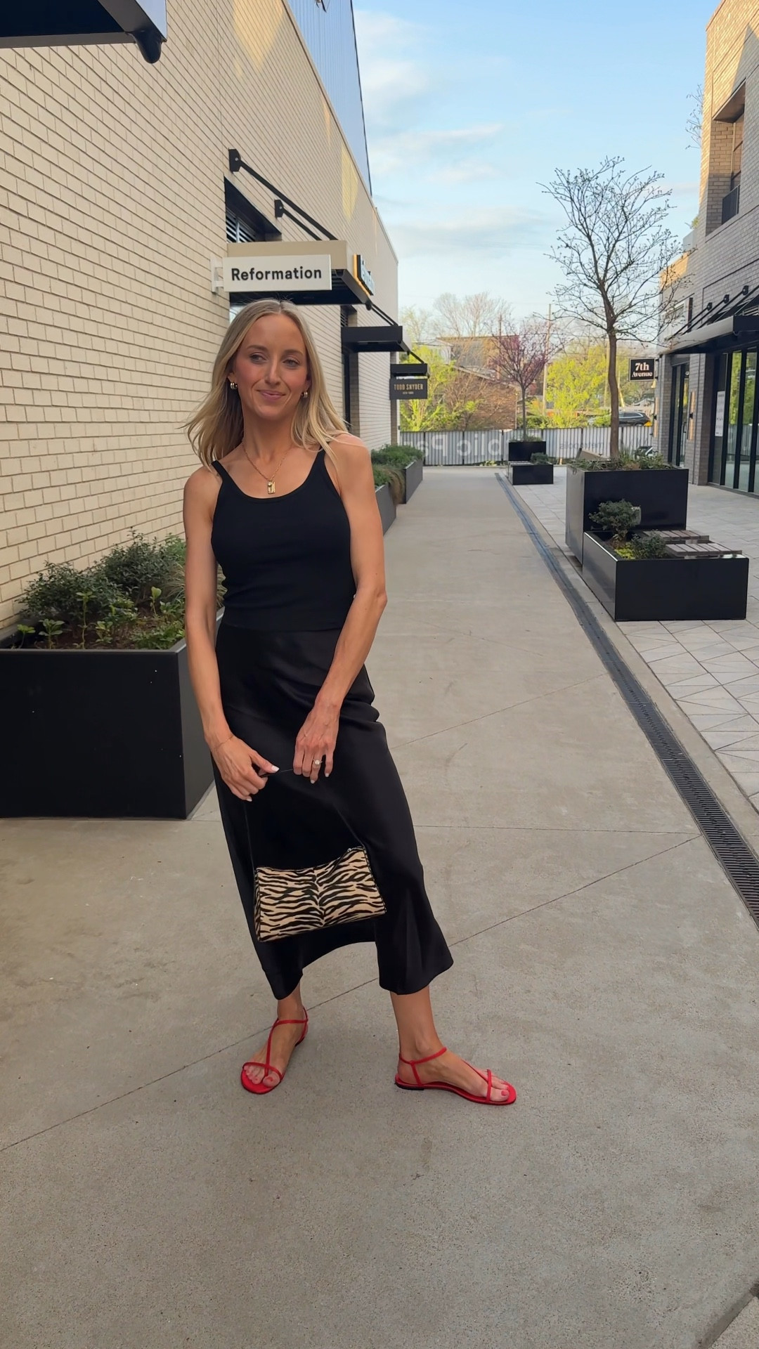 Date night look:

Quince washable silk skirt - small
Amazon tank - small (this style is cropped so I also linked my other fave Amazon tank that is not cropped)
Reformation red sandals: true to size 
Zebra bag - investment piece that I LOVE 

#LTKootd