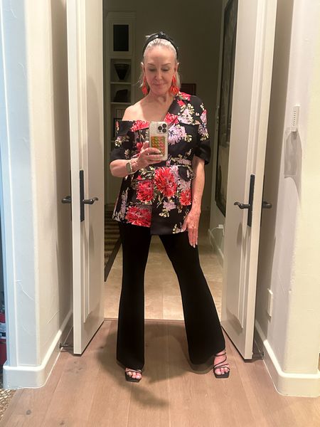 @cinqasept Katie jacket in dark chrysanthemum print over flare pants. Low heeled strappy sandal by @jeffreycampbell 
Statement floral earrings 
Resort wear, summer party 

#LTKparties #LTKover40 #LTKstyletip