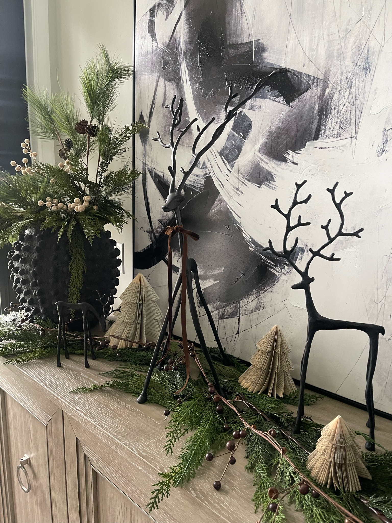 Christmas Decor
Pottery barn black deer, anthropologie vase, paper book trees, garland, faux pine stems, Christmas decor, holiday decor, home decor, Christmas decorating, garland, Christmas deer
#pottery barn #anthropologie 

#LTKHoliday #LTKhome #LTKSeasonal