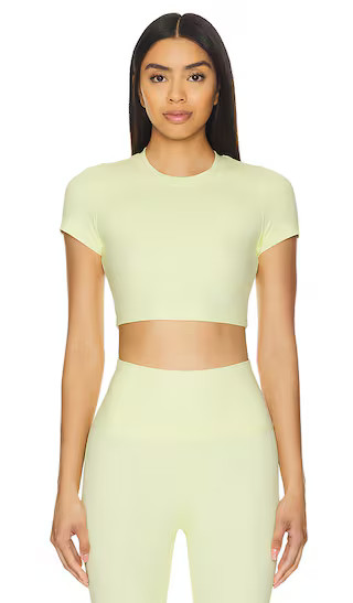 Milan Cropped Baby Tee in Yellow | Revolve Clothing (Global)