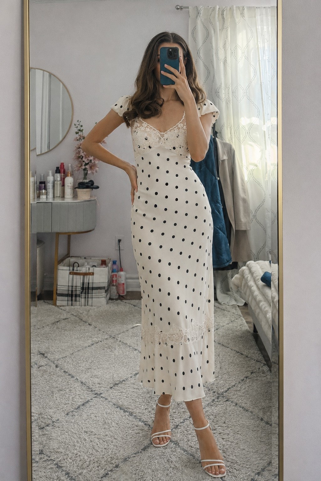 European summer outfit but make it timeless 🤍 This white polka dot midi dress with lace detail is perfect for vacation dinners, bridal events, date night, wine nights, summer parties, and coastal summer trips. Styled with minimal white heels for an elegant old money inspired look that feels feminine and effortless. Such a chic summer dress moment.
#LTKdayinmylife #LTKgrwm #LTKootd #LTKSeasonal #LTKU #LTKSaleAlert #LTKPetite #LTKWorkwear #LTKWedding

white summer dress | polka dot dress | white midi dress | classy summer outfit | feminine summer outfit | vacation dinner outfit | date night dress | bridal shower dress | Italy outfit | old money outfit | chic vacation outfit | summer wedding guest dress | Parisian style outfit | elegant summer dress | resort wear outfit | feminine midi dress | white heels outfit | dinner outfit ideas | summer vacation outfits | romantic summer outfit | vacation dress | neutral outfit ideas | lace detail dress | effortless chic outfit | timeless fashion outfit | strappy white sandals |