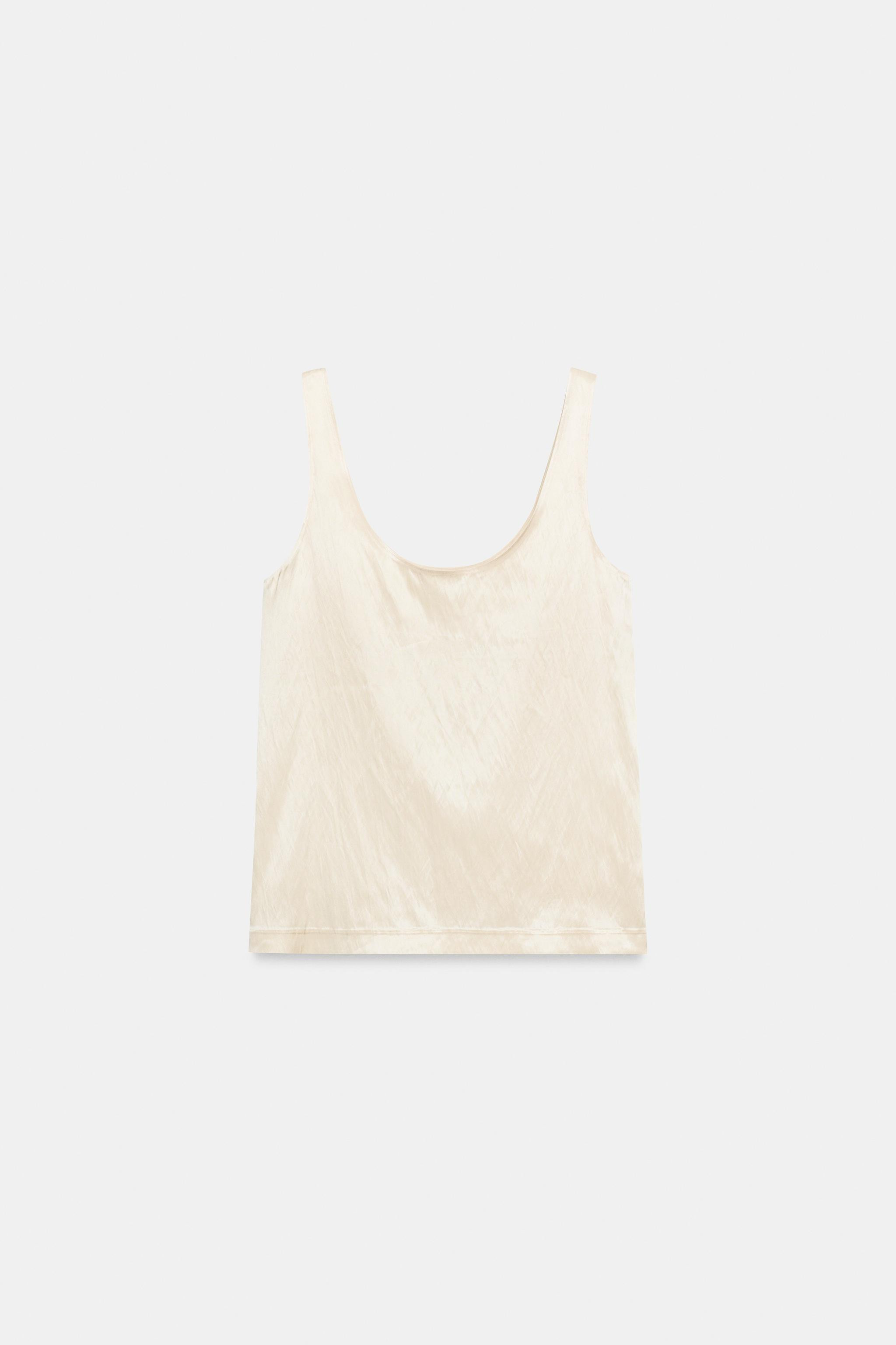 Top crafted from satin fabric. Round neckline and straps. | Zara UK